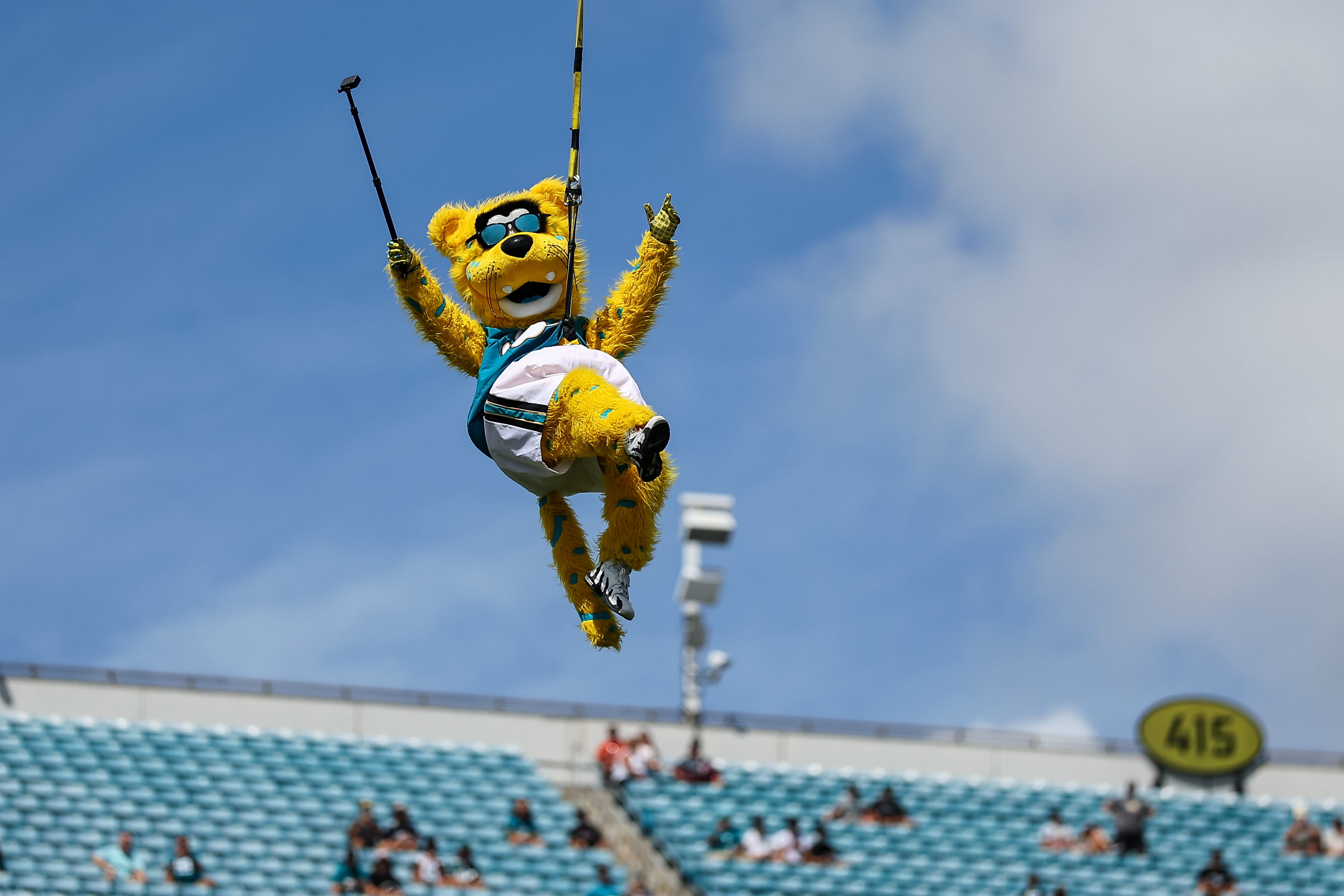JACKSONVILLE, FLORIDA - SEPTEMBER 21: Mascot Jaxson de Ville of the Jacksonville Jaguars leaps from the light towers prior to the game against the Houston Texans at EverBank Field on September 21, 2025 in Jacksonville, Florida. (Photo by Mike Carlson/Getty Images)