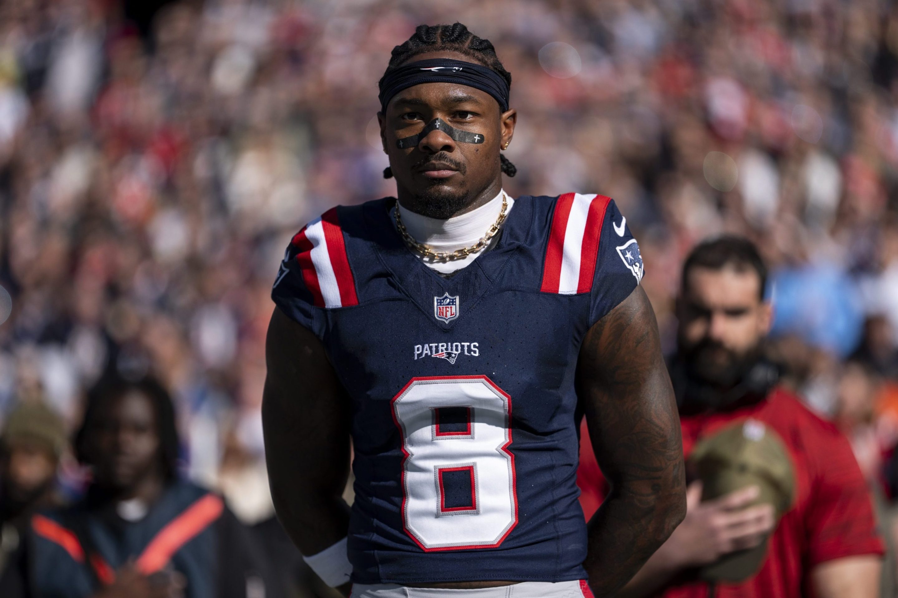Stefon Diggs #8 of the New England Patriots looks on during the national anthem prior to an NFL football game against the Atlanta Falcons at Gillette Stadium on November 02, 2025 in Foxborough, Massachusetts.
