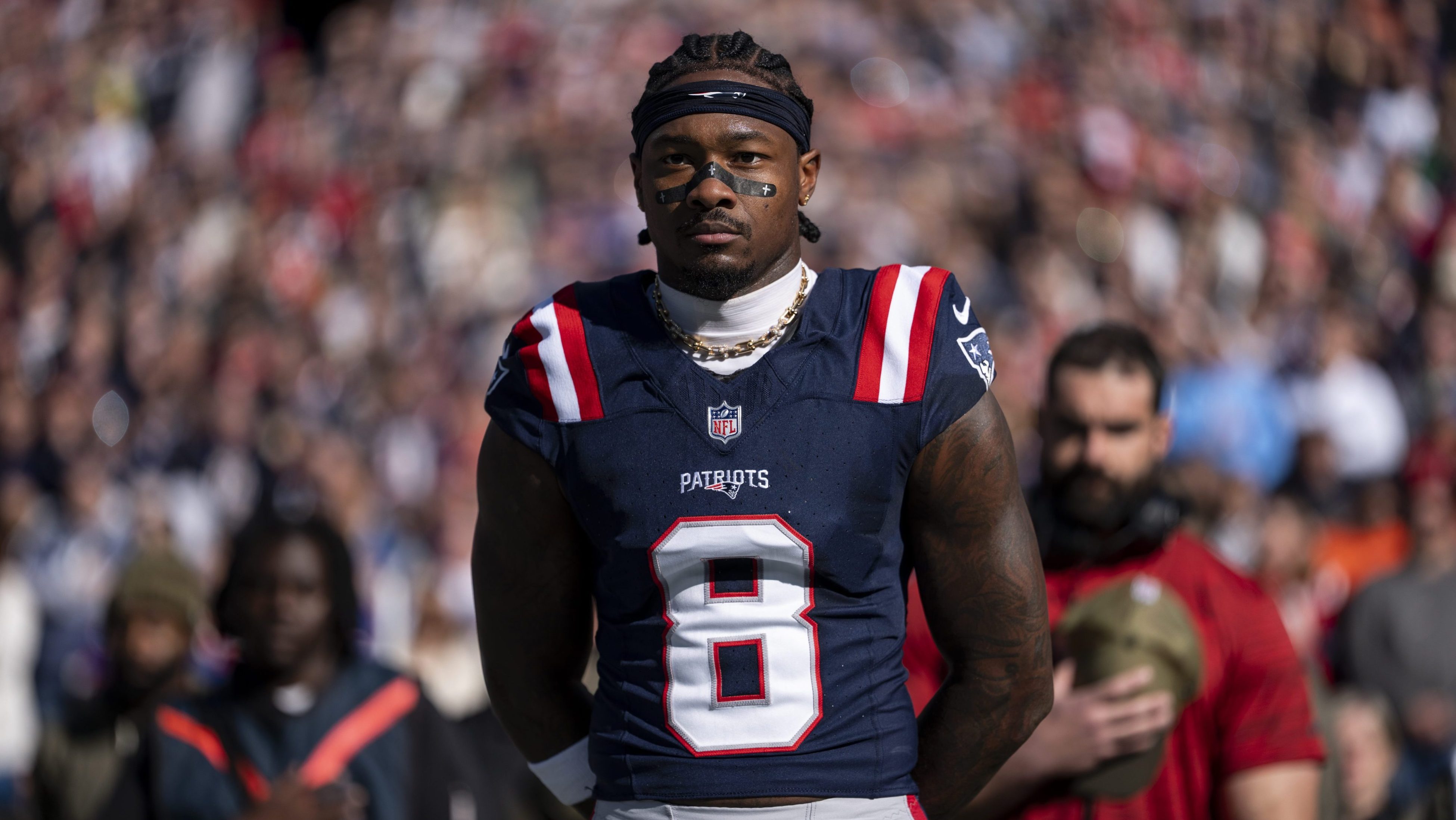 Stefon Diggs #8 of the New England Patriots looks on during the national anthem prior to an NFL football game against the Atlanta Falcons at Gillette Stadium on November 02, 2025 in Foxborough, Massachusetts.