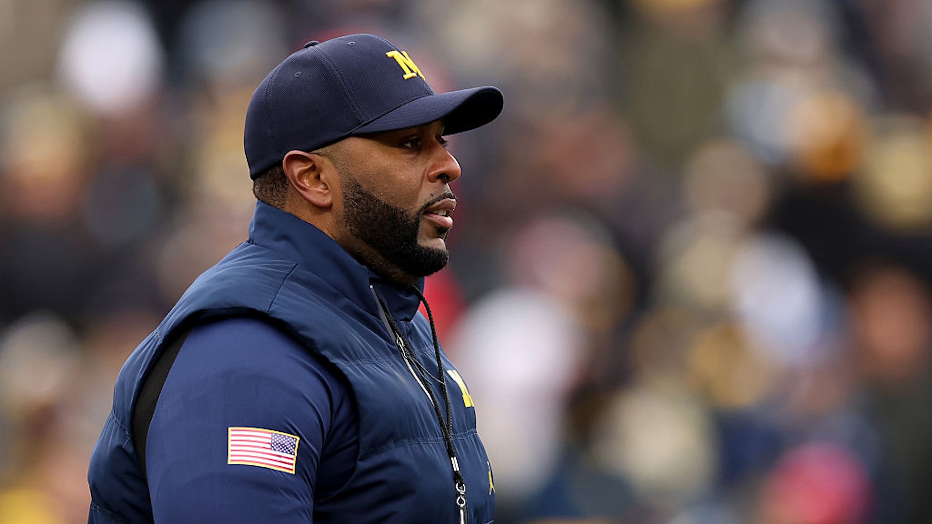 Head coach Sherrone Moore of the Michigan Wolverines looks on before the game against the Ohio State Buckeyes at Michigan Stadium on November 29, 2025 in Ann Arbor, Michigan.