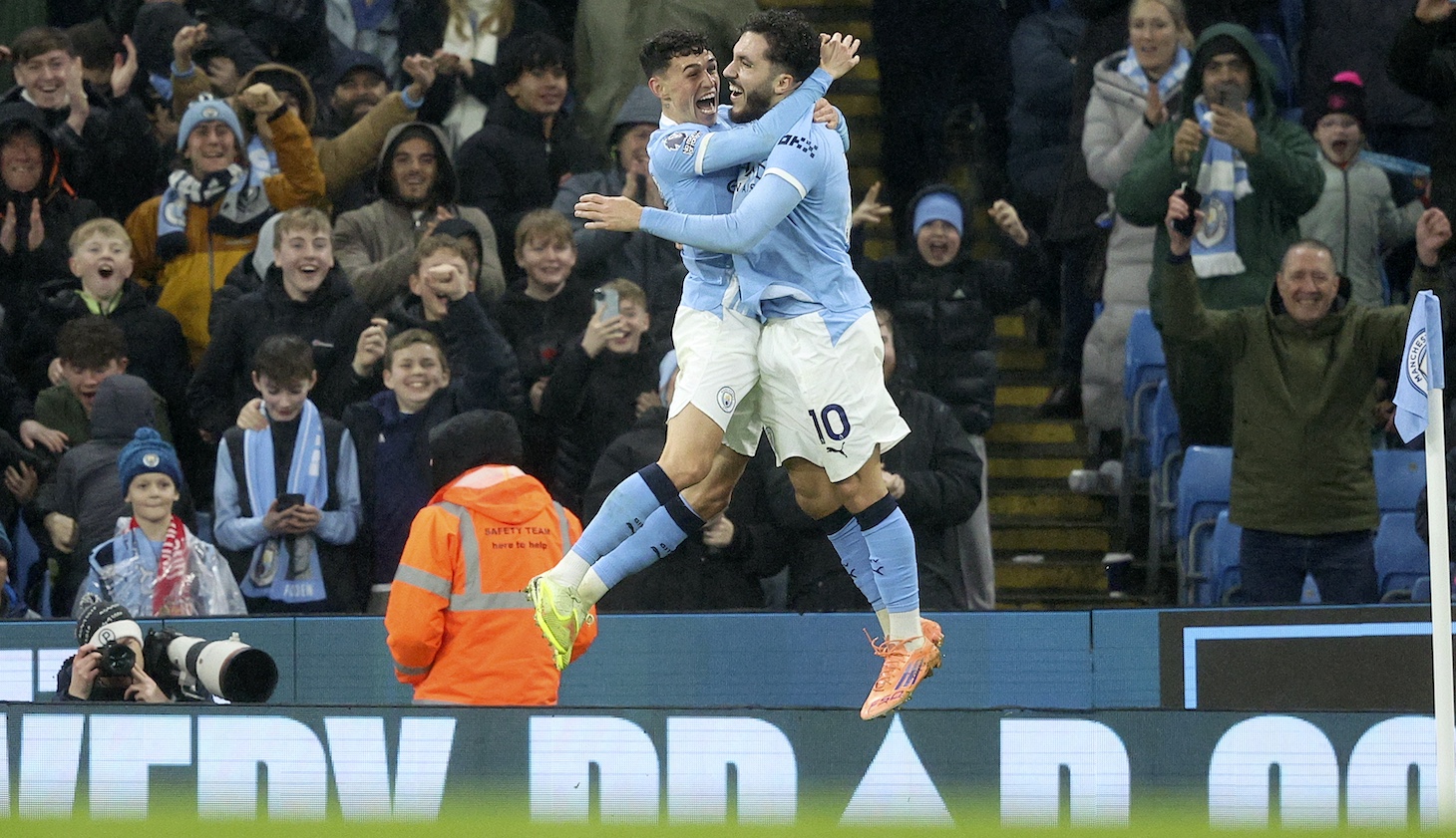 Phil Foden of Manchester City and Rayan Cherki of Manchester City celebrate 4th goal during the Premier League match between Manchester City and Sunderland at Etihad Stadium on December 6, 2025 in Manchester, England.