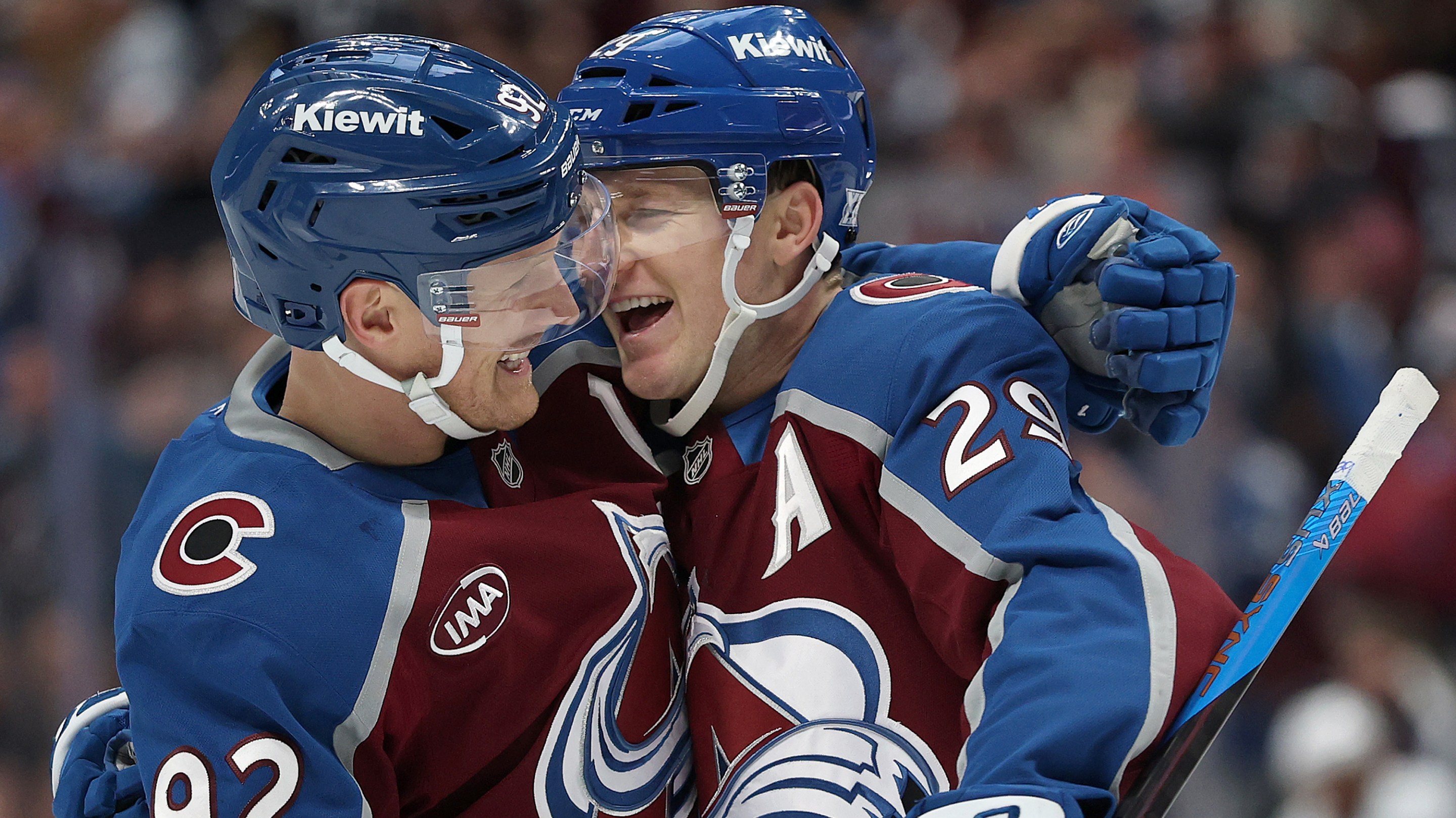 Nathan MacKinnon #29 of the Colorado Avalanche celebrates with Gabriel Landeskog