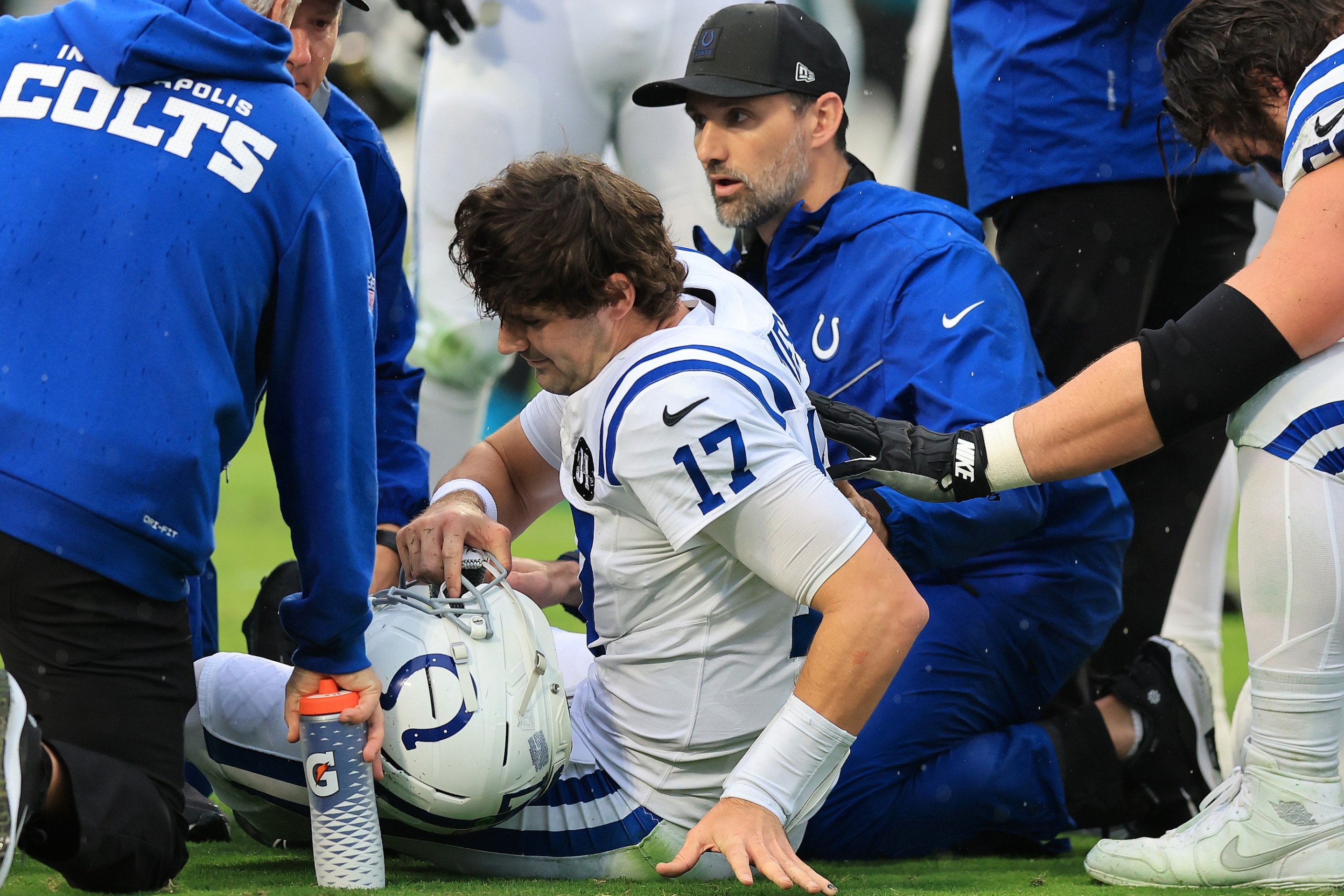 JACKSONVILLE, FLORIDA - DECEMBER 07: Daniel Jones #17 of the Indianapolis Colts is checked on by trainers after an injury during the first quarter against the Jacksonville Jaguars at EverBank Stadium on December 07, 2025 in Jacksonville, Florida. (Photo by Mike Carlson/Getty Images)