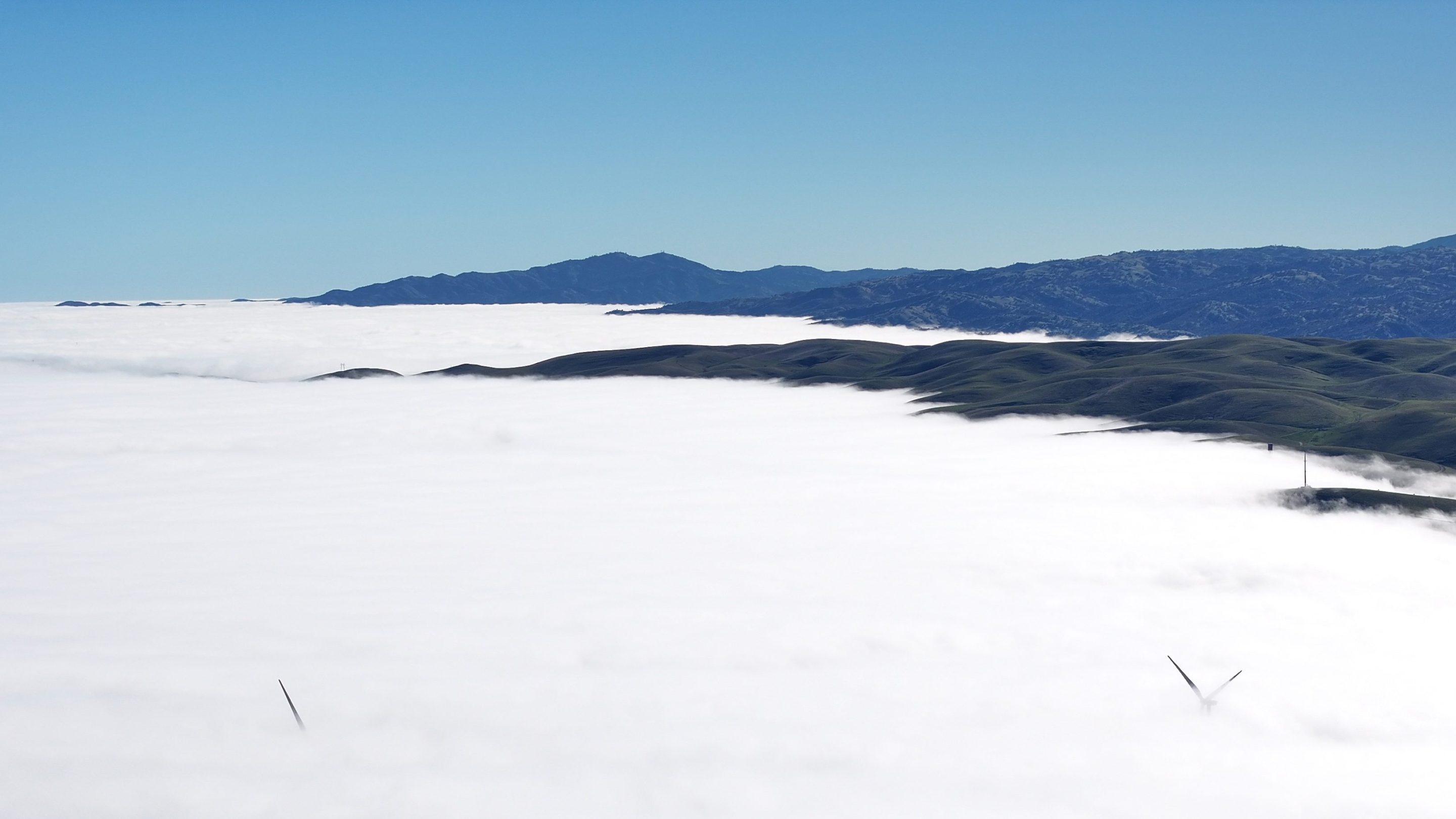 LIVERMORE, CALIFORNIA - DECEMBER 13: A view of dense fog over Interstate Highway 580 (I-580) and wind turbines in Livermore, California, United States on December 13, 2025. (Photo by Tayfun Coskun/Anadolu via Getty Images)