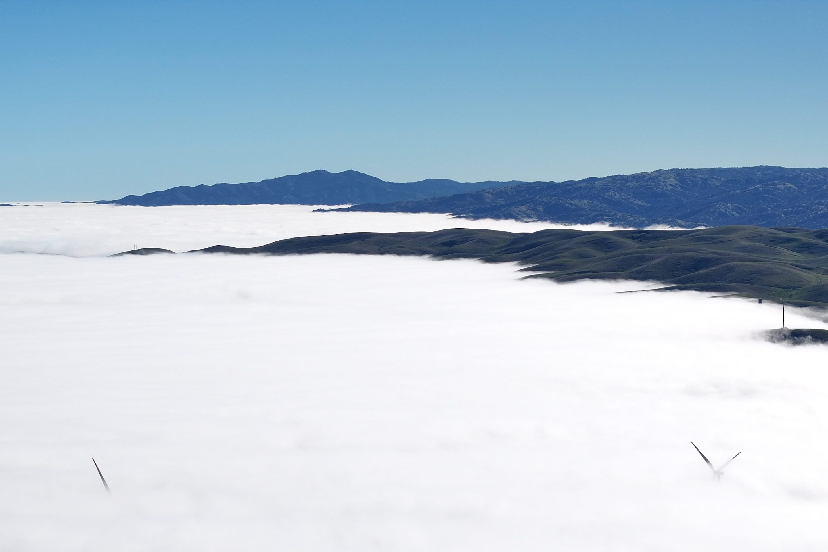 LIVERMORE, CALIFORNIA - DECEMBER 13: A view of dense fog over Interstate Highway 580 (I-580) and wind turbines in Livermore, California, United States on December 13, 2025. (Photo by Tayfun Coskun/Anadolu via Getty Images)