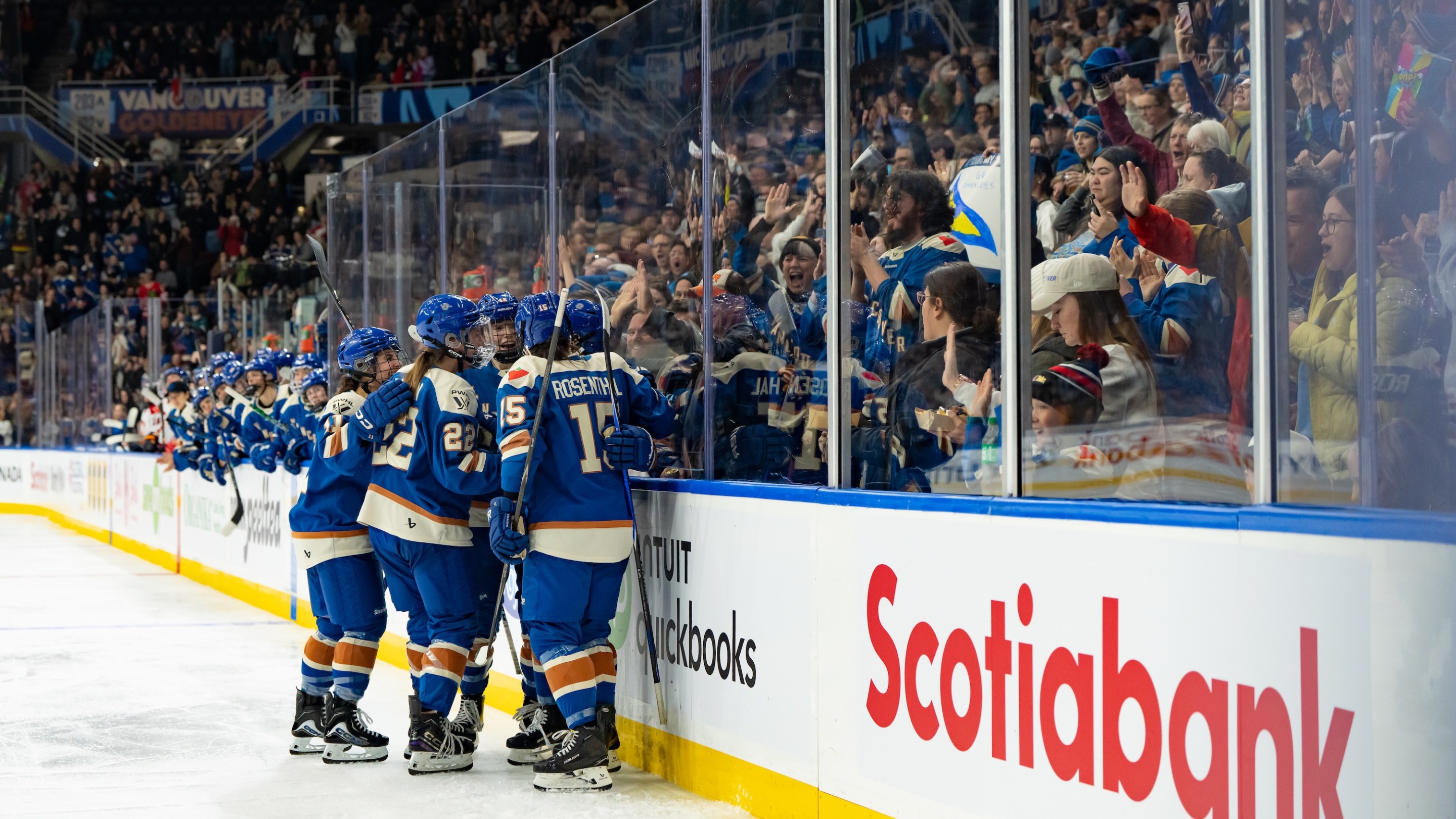Jennifer Gardiner #12 of the Vancouver Goldeneyes is congratulated after scoring a goal during the second period of their PWHL game against the Ottawa Charge at Pacific Coliseum on December 16, 2025 in Vancouver, Canada.