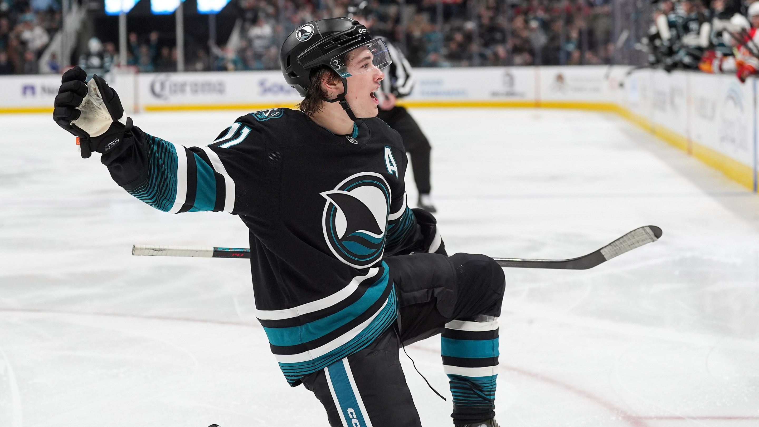 Macklin Celebrini #71 of the San Jose Sharks celebrates scoring a goal in the third period against the Calgary Flames