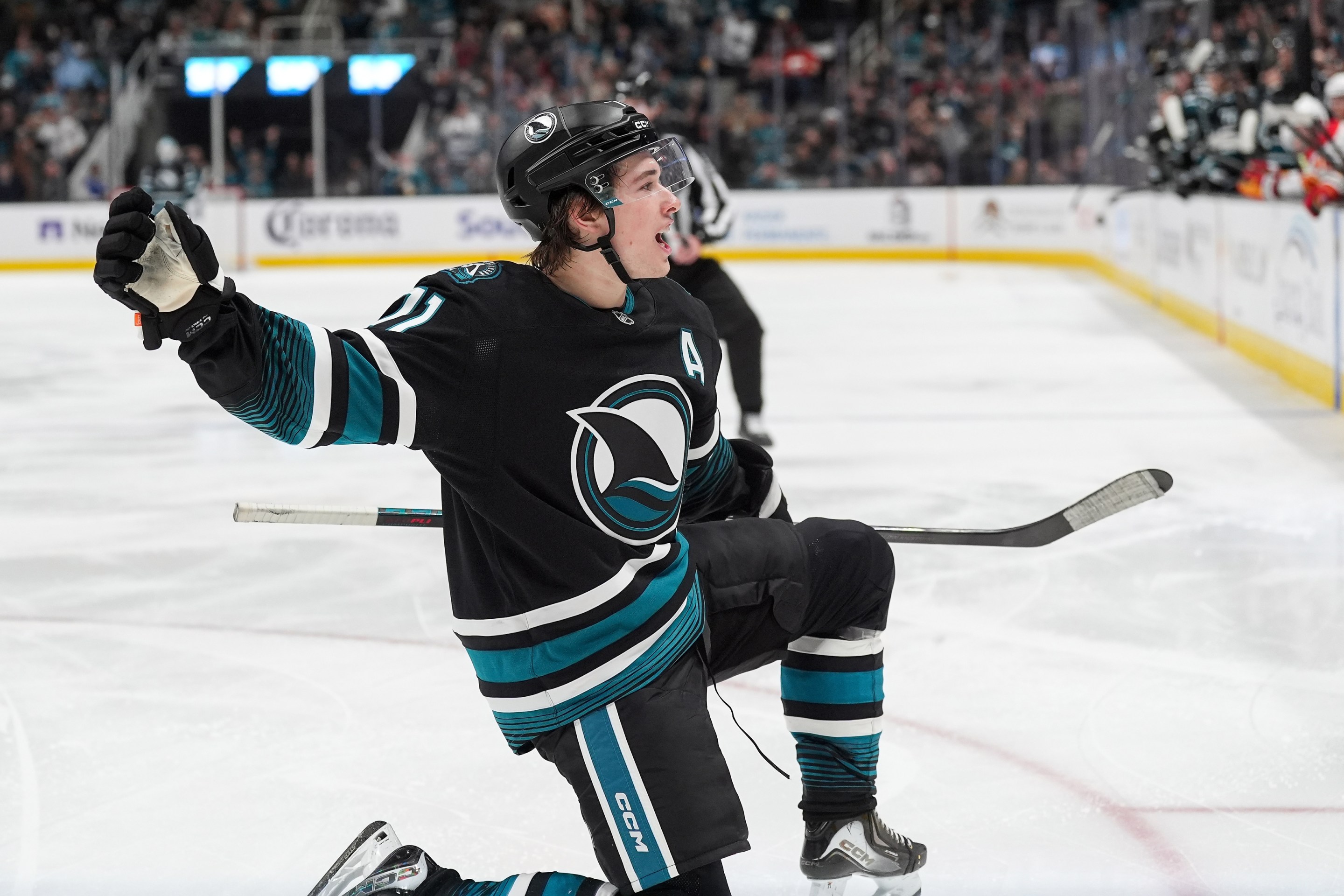Macklin Celebrini #71 of the San Jose Sharks celebrates scoring a goal in the third period against the Calgary Flames