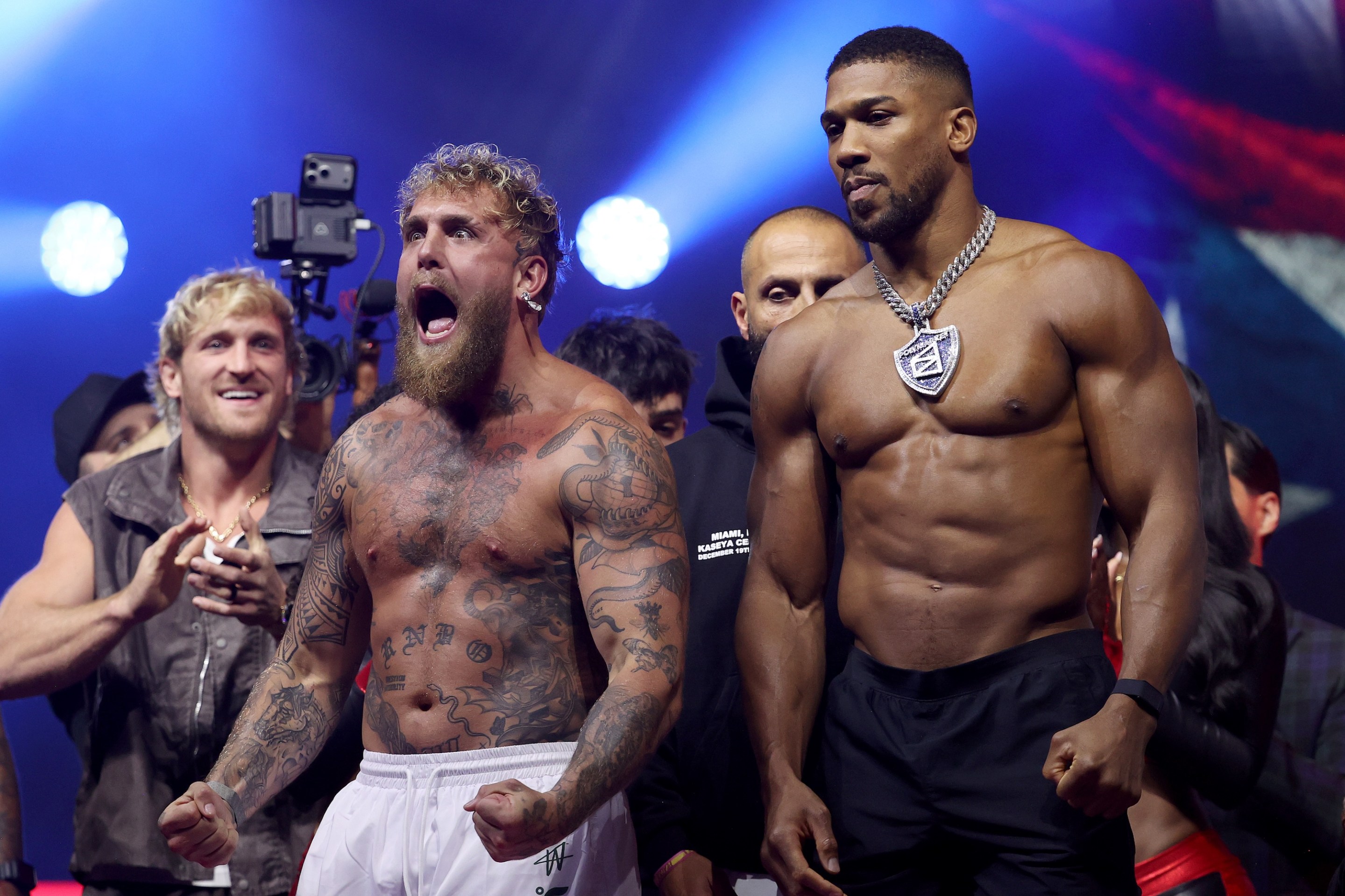 MIAMI, FLORIDA - DECEMBER 18: Jake Paul and Anthony Joshua face off during their ceremonial weigh-in ahead their fight as part of Jake Paul v Anthony Joshua at The Fillmore Miami Beach on December 18, 2025 in Miami Beach, Florida. (Photo by Leonardo Fernandez/Getty Images)