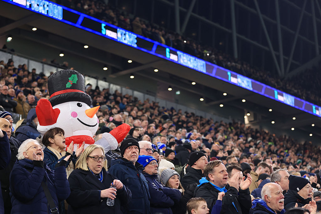A fan dressed in a snowman costume looks on during the Premier League match between Everton and Arsenal at Hill Dickinson Stadium on December 20, 2025 in Liverpool, England.