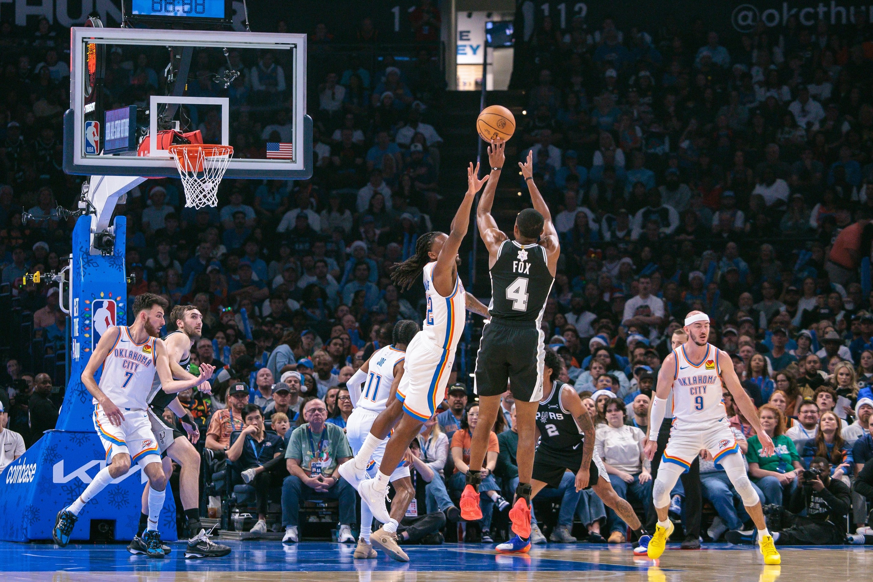 OKLAHOMA CITY, OKLAHOMA - DECEMBER 25: De'Aaron Fox #4 of the San Antonio Spurs shoots the ball during the first half against the Oklahoma City Thunder at Paycom Center on December 25, 2025 in Oklahoma City, Oklahoma. NOTE TO USER: User expressly acknowledges and agrees that, by downloading and or using this photograph, User is consenting to the terms and conditions of the Getty Images License Agreement. (Photo by William Purnell/Getty Images)