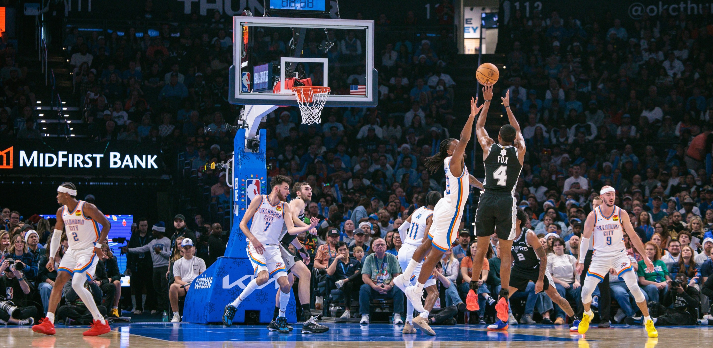 OKLAHOMA CITY, OKLAHOMA - DECEMBER 25: De'Aaron Fox #4 of the San Antonio Spurs shoots the ball during the first half against the Oklahoma City Thunder at Paycom Center on December 25, 2025 in Oklahoma City, Oklahoma. NOTE TO USER: User expressly acknowledges and agrees that, by downloading and or using this photograph, User is consenting to the terms and conditions of the Getty Images License Agreement. (Photo by William Purnell/Getty Images)