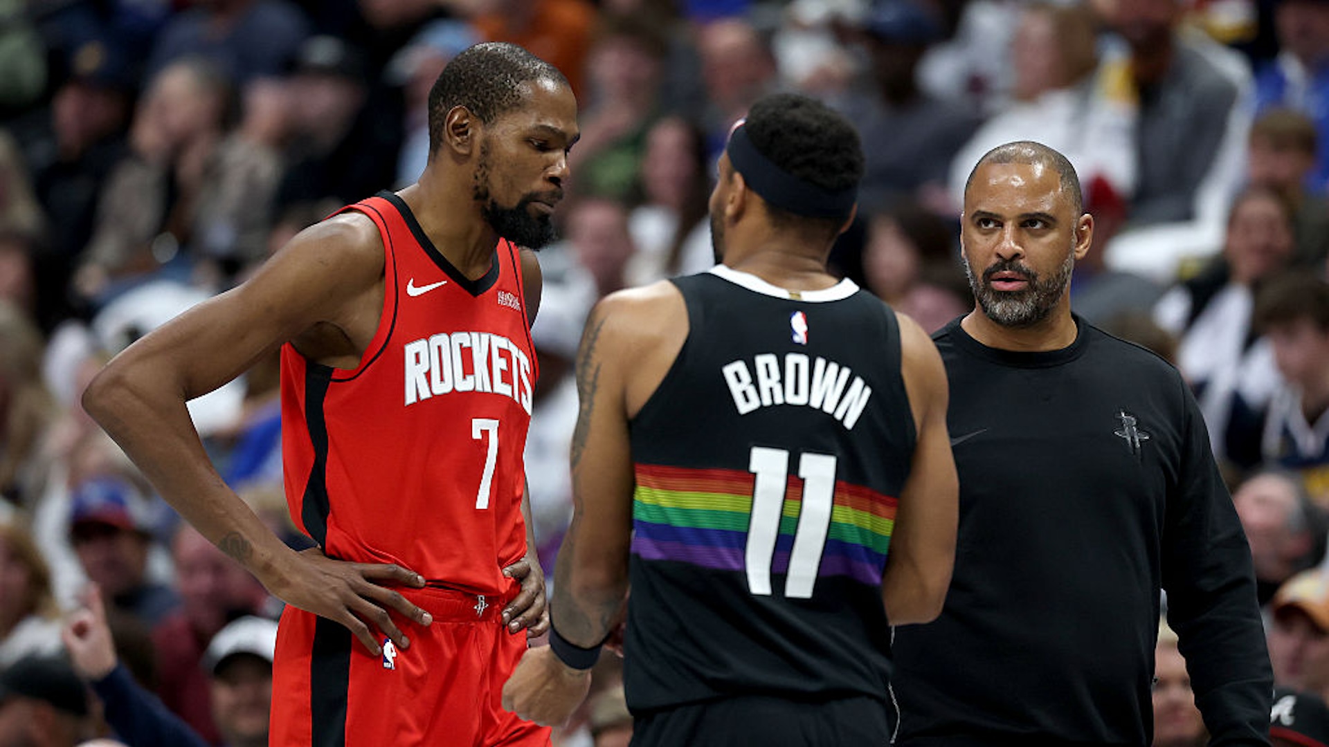 Kevin Durant #7of the Houston Rockets exchanges words with Bruce Brown #11 of the Denver Nuggets in the fourth quarter at Ball Arena on December 20, 2025 in Denver, Colorado.