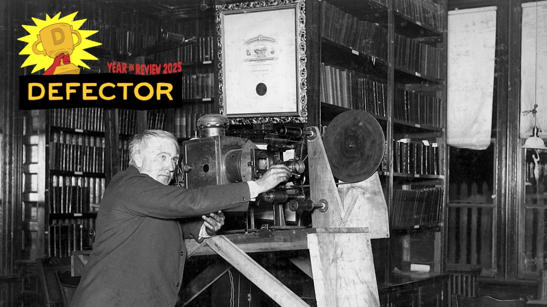 Thomas A. Edison (1847-1931) experimenting with the first motion picture machine. B/W photo,1905.