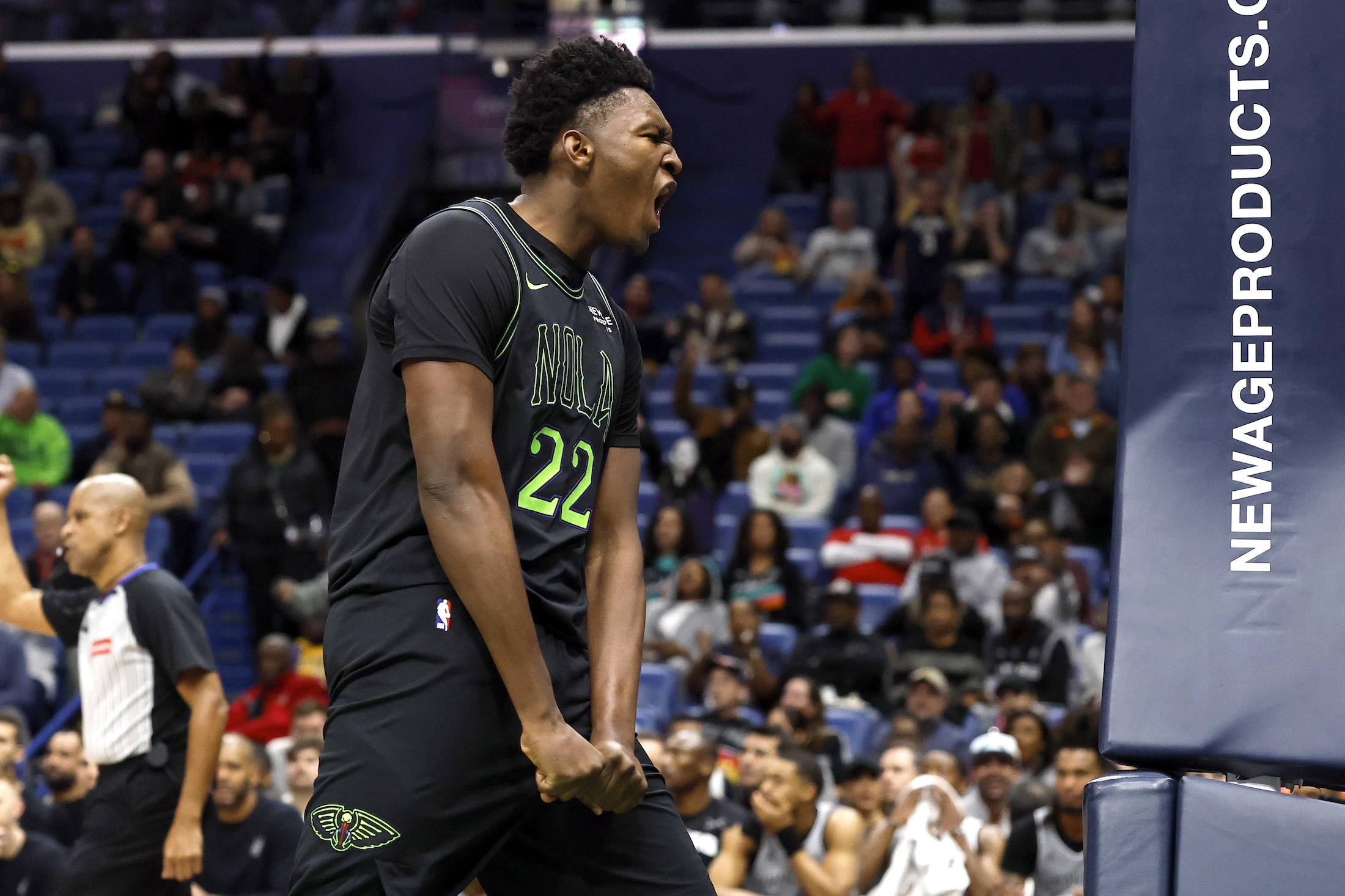 NEW ORLEANS, LOUISIANA - DECEMBER 08: Derik Queen #22 of the New Orleans Pelicans reacts after a play during the second half of a game against the San Antonio Spurs at Smoothie King Center on December 08, 2025 in New Orleans, Louisiana. NOTE TO USER: User expressly acknowledges and agrees that, by downloading and or using this photograph, User is consenting to the terms and conditions of the Getty Images License Agreement. (Photo by Tyler Kaufman/Getty Images)