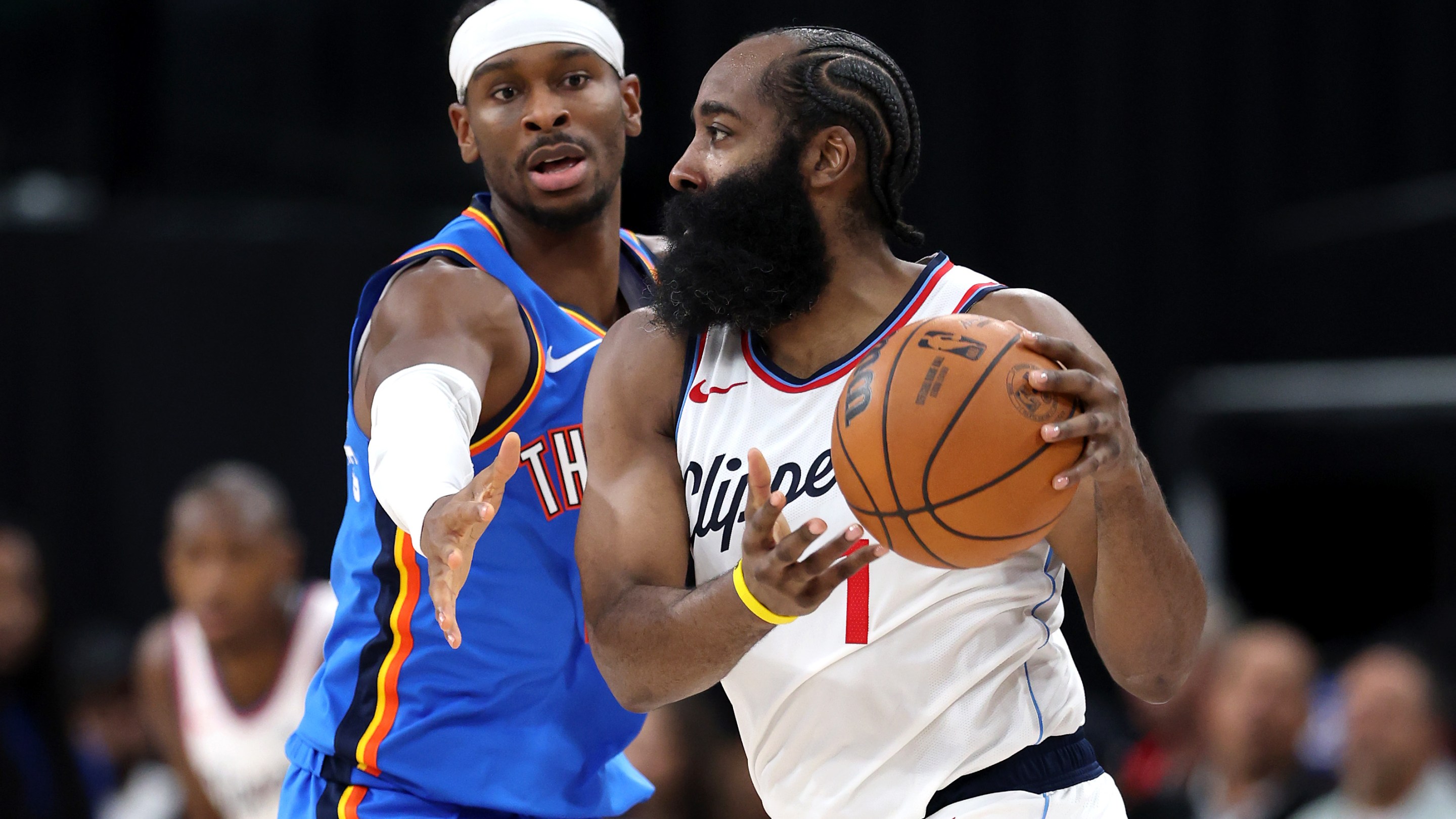 INGLEWOOD, CALIFORNIA - NOVEMBER 04: Shai Gilgeous-Alexander #2 of the Oklahoma City Thunder defends James Harden #1 of the Los Angeles Clippers at Intuit Dome on November 04, 2025 in Inglewood, California. NOTE TO USER: User expressly acknowledges and agrees that, by downloading and or using this photograph, user is consenting to the terms and conditions of the Getty Images License Agreement. (Photo by Luke Hales/Getty Images)