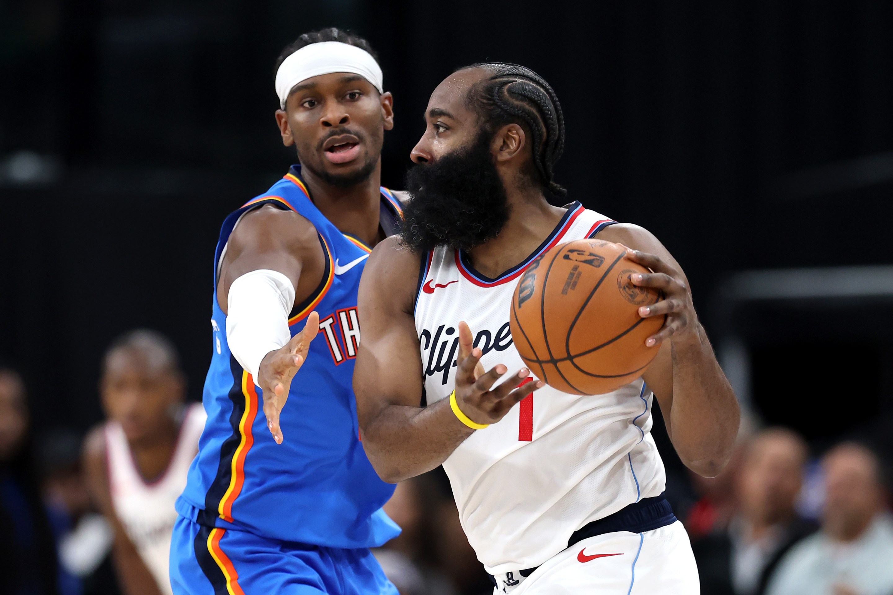 INGLEWOOD, CALIFORNIA - NOVEMBER 04: Shai Gilgeous-Alexander #2 of the Oklahoma City Thunder defends James Harden #1 of the Los Angeles Clippers at Intuit Dome on November 04, 2025 in Inglewood, California. NOTE TO USER: User expressly acknowledges and agrees that, by downloading and or using this photograph, user is consenting to the terms and conditions of the Getty Images License Agreement. (Photo by Luke Hales/Getty Images)
