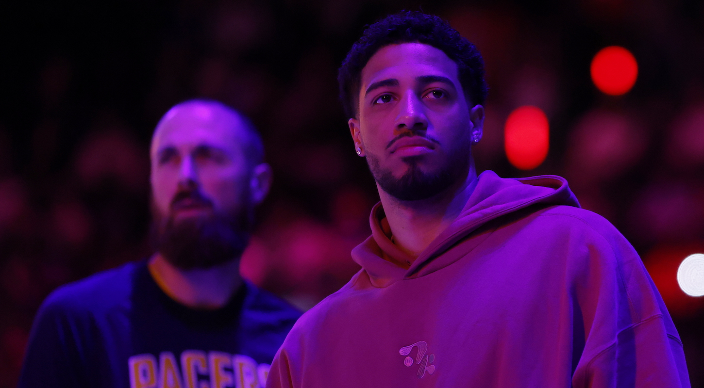 Tyrese Haliburton of the Indiana Pacers looks on in street clothes during player introductions before a game against the Detroit Pistons