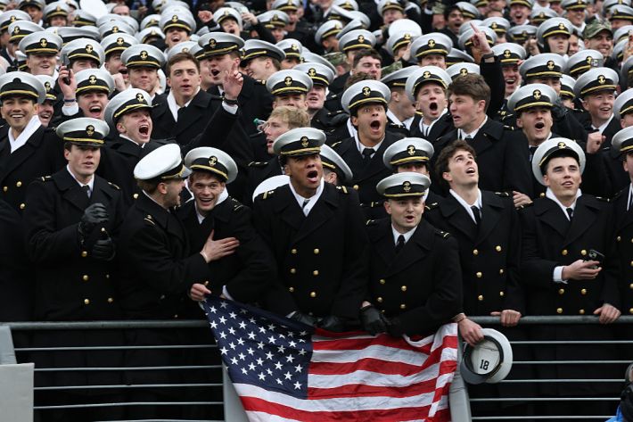 BALTIMORE, MARYLAND - DECEMBER 13: U.S. Navy Midshipmen wait for the start of the 126th Army-Navy Game between the Army Black Knights and the Navy Midshipmen at M&T Bank Stadium on December 13, 2025 in Baltimore, Maryland. The teams are competing for the Commander-in-Chief's Trophy.