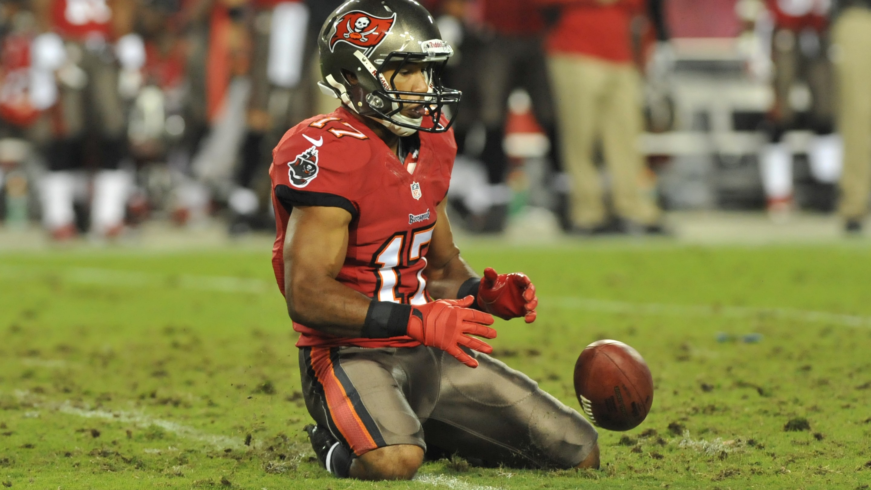 TAMPA, FL - OCTOBER 24: Wide receiver Eric Page #17 of the Tampa Bay Buccaneers fumbles a punt return against the Carolina Panthers October 24, 2013 at Raymond James Stadium in Tampa, Florida. Carolina recovered and won 31 - 13. (Photo by Al Messerschmidt/Getty Images)