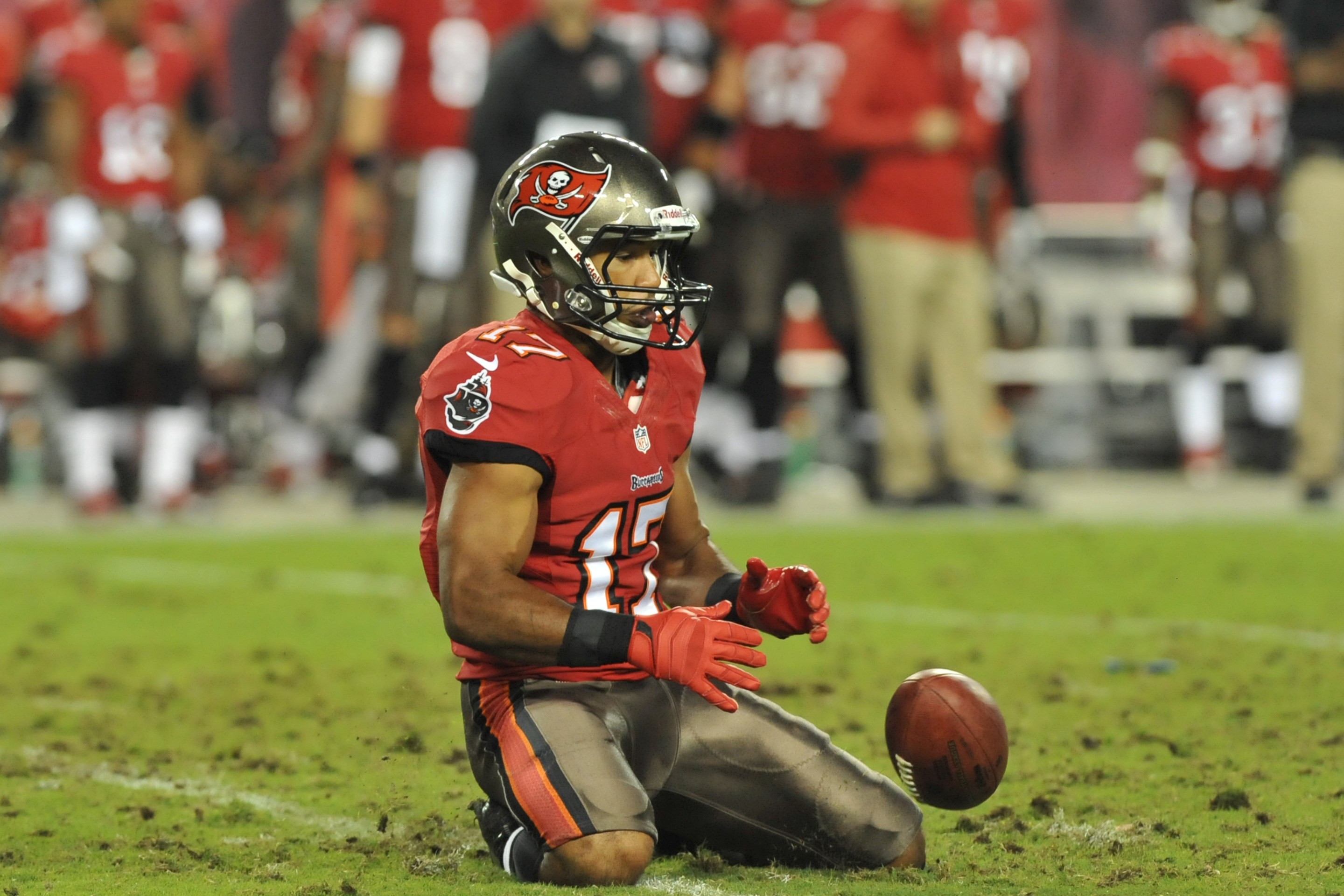 TAMPA, FL - OCTOBER 24: Wide receiver Eric Page #17 of the Tampa Bay Buccaneers fumbles a punt return against the Carolina Panthers October 24, 2013 at Raymond James Stadium in Tampa, Florida. Carolina recovered and won 31 - 13. (Photo by Al Messerschmidt/Getty Images)