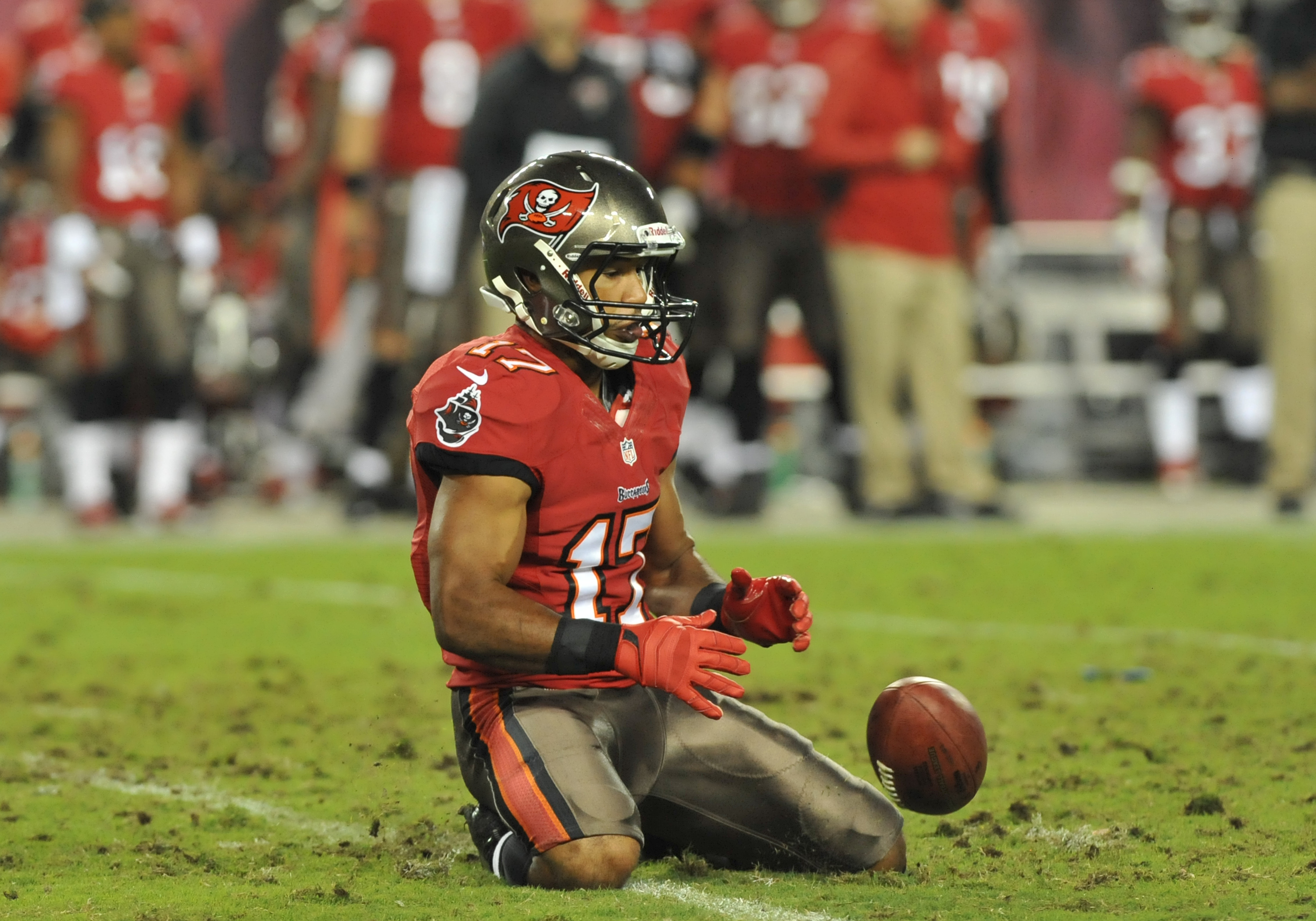 TAMPA, FL - OCTOBER 24: Wide receiver Eric Page #17 of the Tampa Bay Buccaneers fumbles a punt return against the Carolina Panthers October 24, 2013 at Raymond James Stadium in Tampa, Florida. Carolina recovered and won 31 - 13. (Photo by Al Messerschmidt/Getty Images)