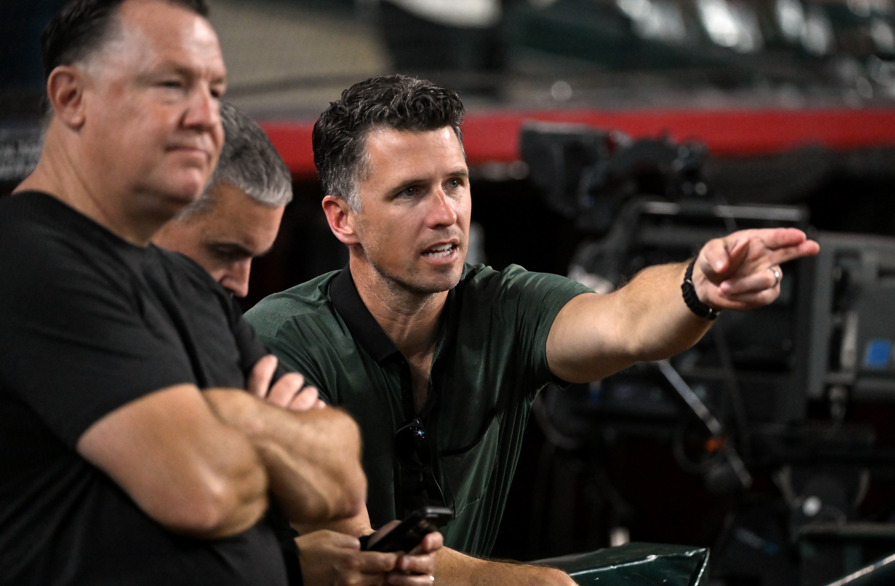 Buster Posey, President of Baseball Operations of the San Francisco Giants prepares for a game against the Arizona Diamondbacks at Chase Field on September 15, 2025.