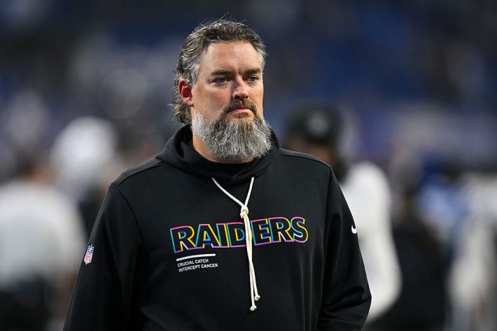 Las Vegas Raiders Offensive Line Coach Brennan Carroll walks off the field after the NFL game between the Las Vegas Raiders and the Indianapolis Colts on October 5, 2025, at Lucas Oil Stadium in Indianapolis, Indiana.
