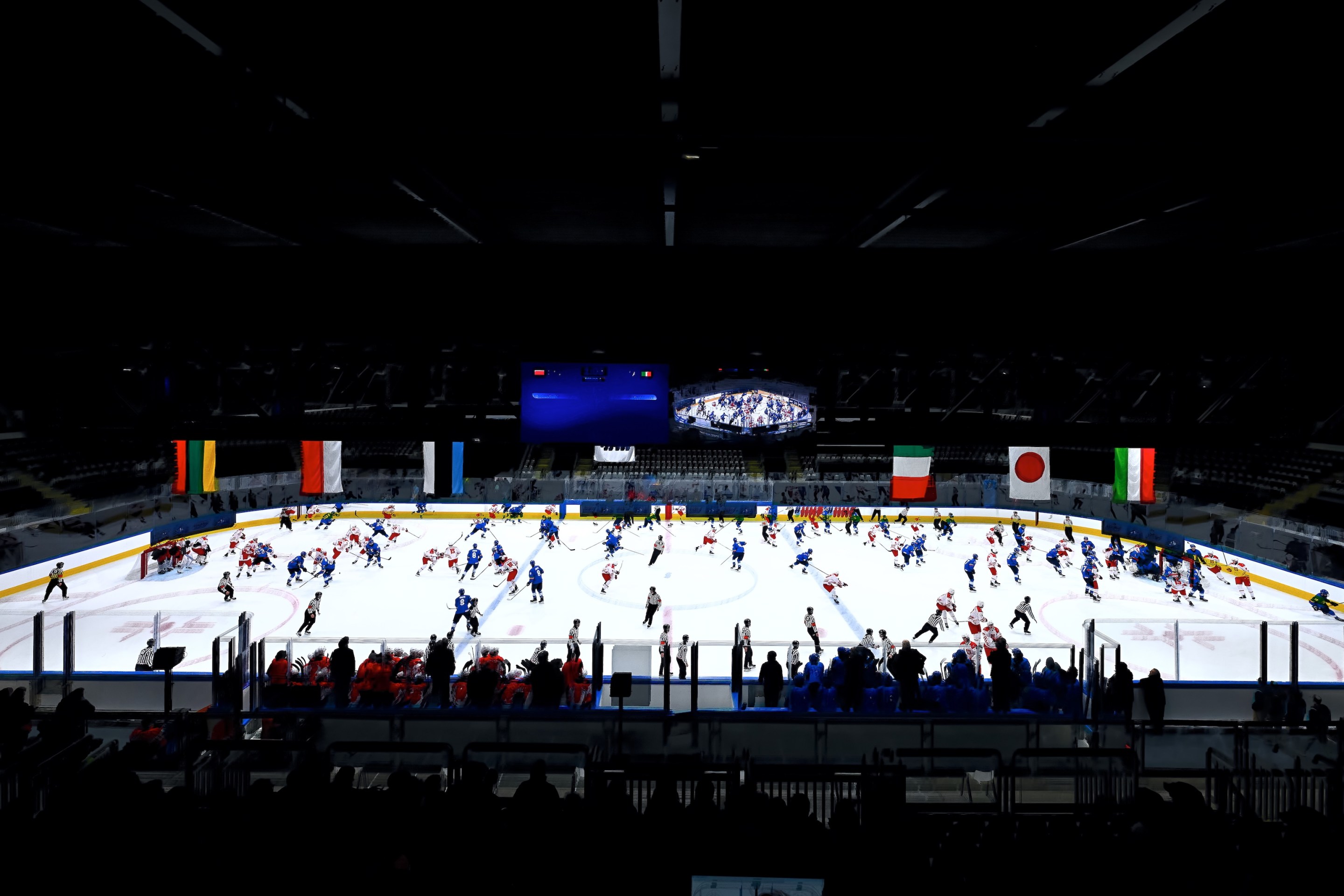 MILAN, ITALY - DECEMBER 08: (EDITOR’S NOTE: Multiple exposures were combined in camera to produce this image.) Players competes during 2026 IIHF U20 World Championship Division Group B match between Poland and Italy at Milano Rho Ice Hockey Arena on December 08, 2025 in Milan, Italy. The event serves as test event for the upcoming Milano Cortina 2026 Winter Olympics. (Photo by Mattia Ozbot/Getty Images)