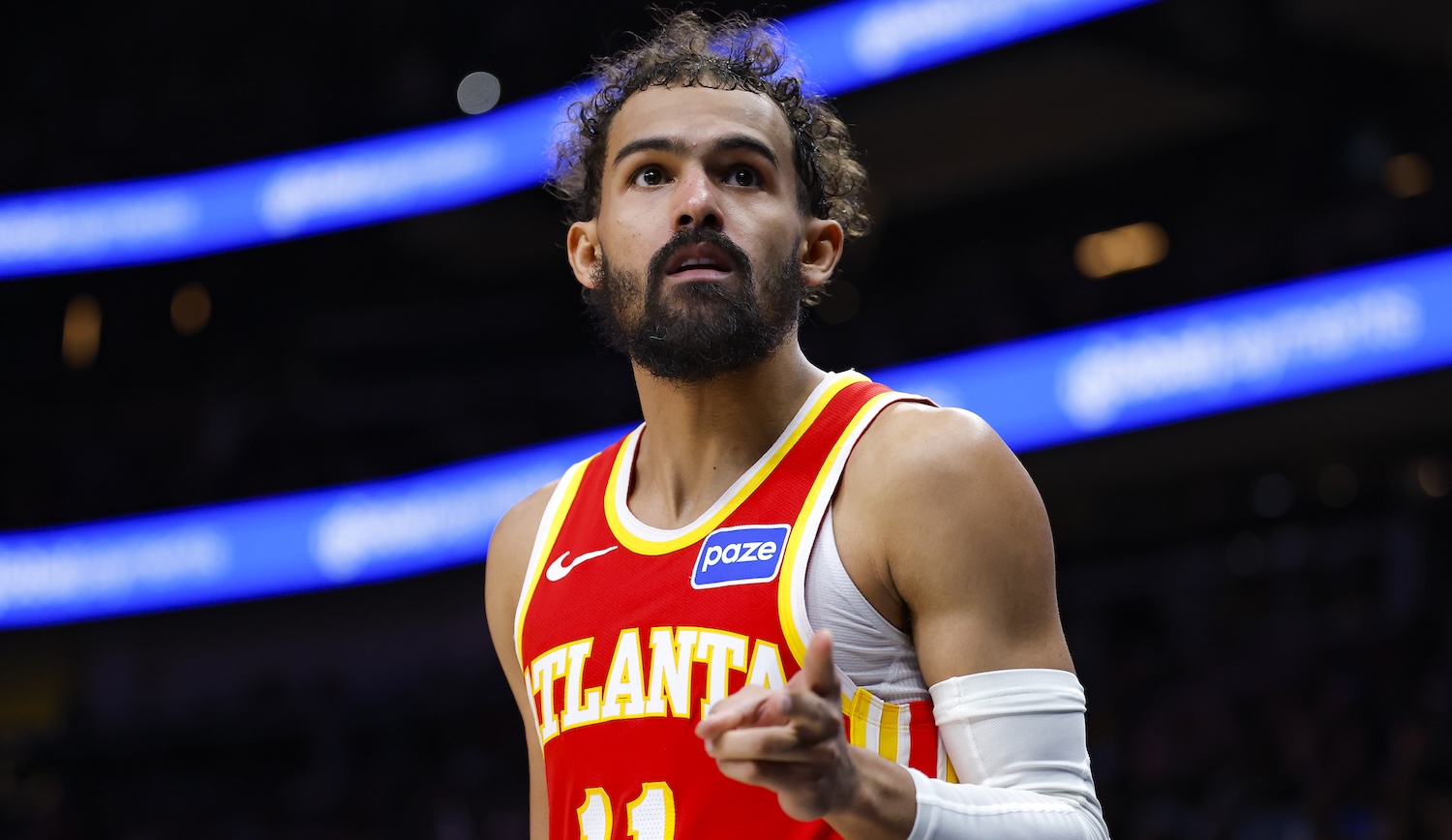 ATLANTA, GEORGIA - DECEMBER 27: Trae Young #11 of the Atlanta Hawks reacts during the third quarter against the New York Knicks at State Farm Arena on December 27, 2025 in Atlanta, Georgia. NOTE TO USER: User expressly acknowledges and agrees that, by downloading and or using this photograph, User is consenting to the terms and conditions of the Getty Images License Agreement. (Photo by Todd Kirkland/Getty Images) *** Local Caption *** Trae Young