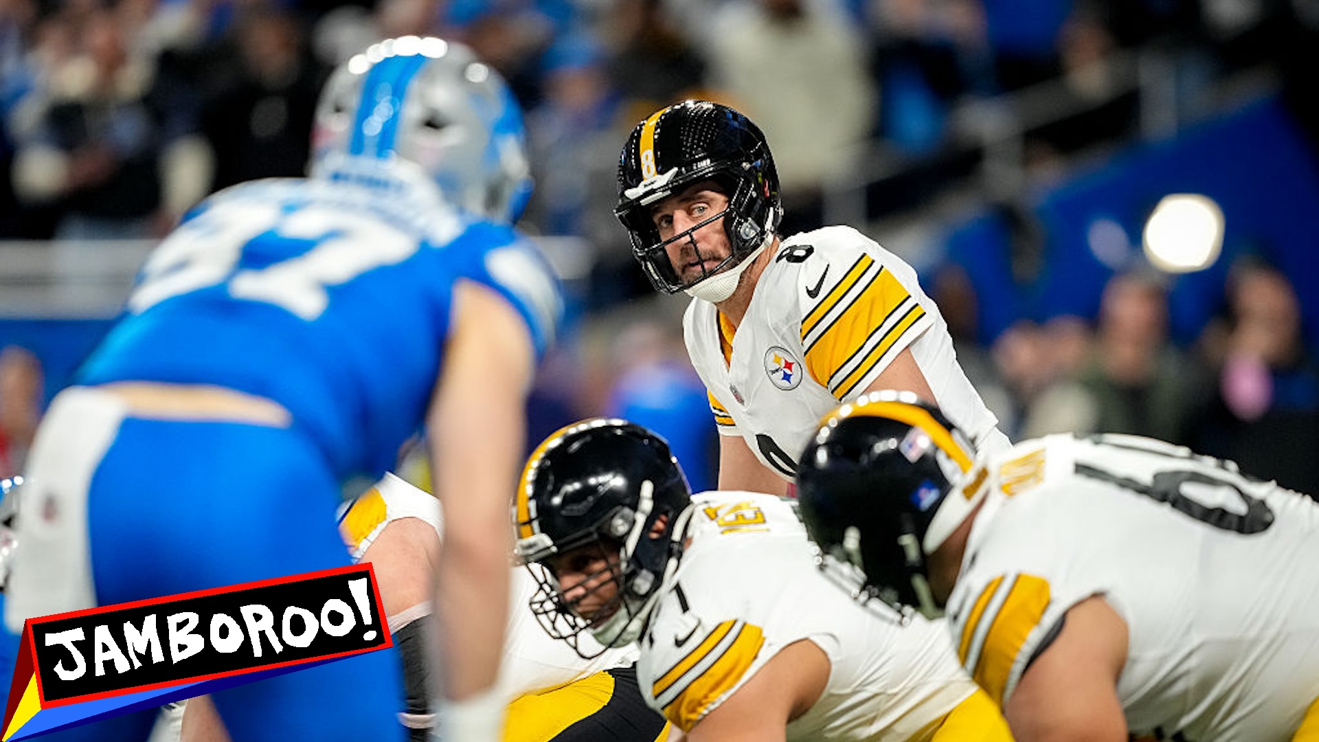 Aaron Rodgers #8 of the Pittsburgh Steelers looks on at the line of scrimmage during the game against the Detroit Lions at Ford Field on December 21, 2025 in Detroit, Michigan.