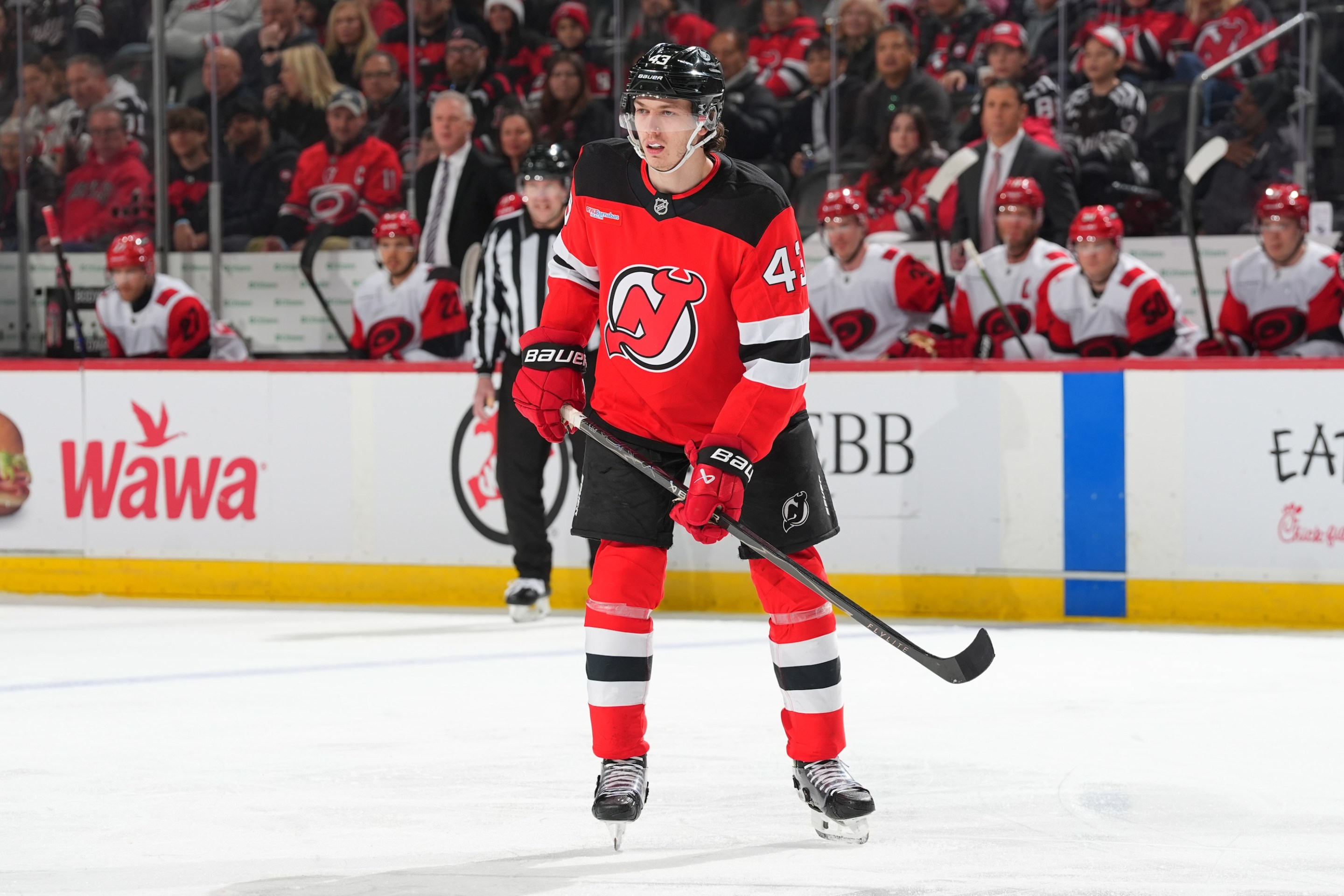 NEWARK, NJ - JANUARY 04: Luke Hughes #43 of the New Jersey Devils skates during the first period of the game against the Carolina Hurricanes on January 4, 2026 at the Prudential Center in Newark, New Jersey. (Photo by Rich Graessle/NHLI via Getty Images)