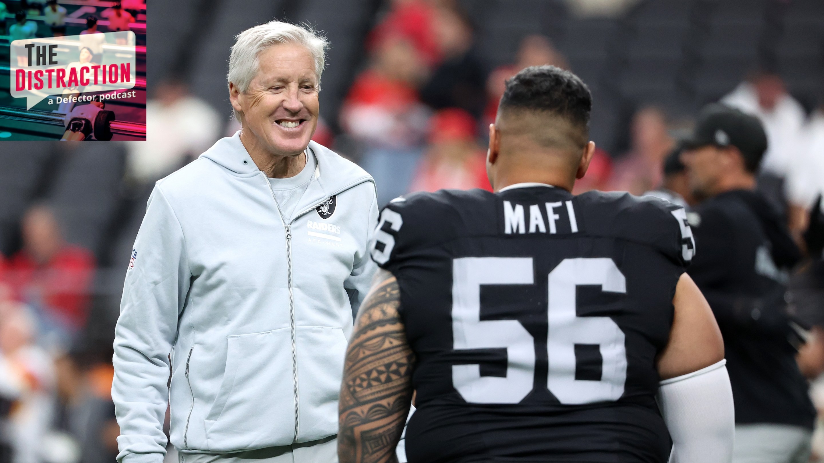 Head coach Pete Carroll of the Las Vegas Raiders speaks with Atonio Mafi #56 prior to the game against the Kansas City Chiefs on January 4. The Raiders actually won this one but fired Carroll shortly after.