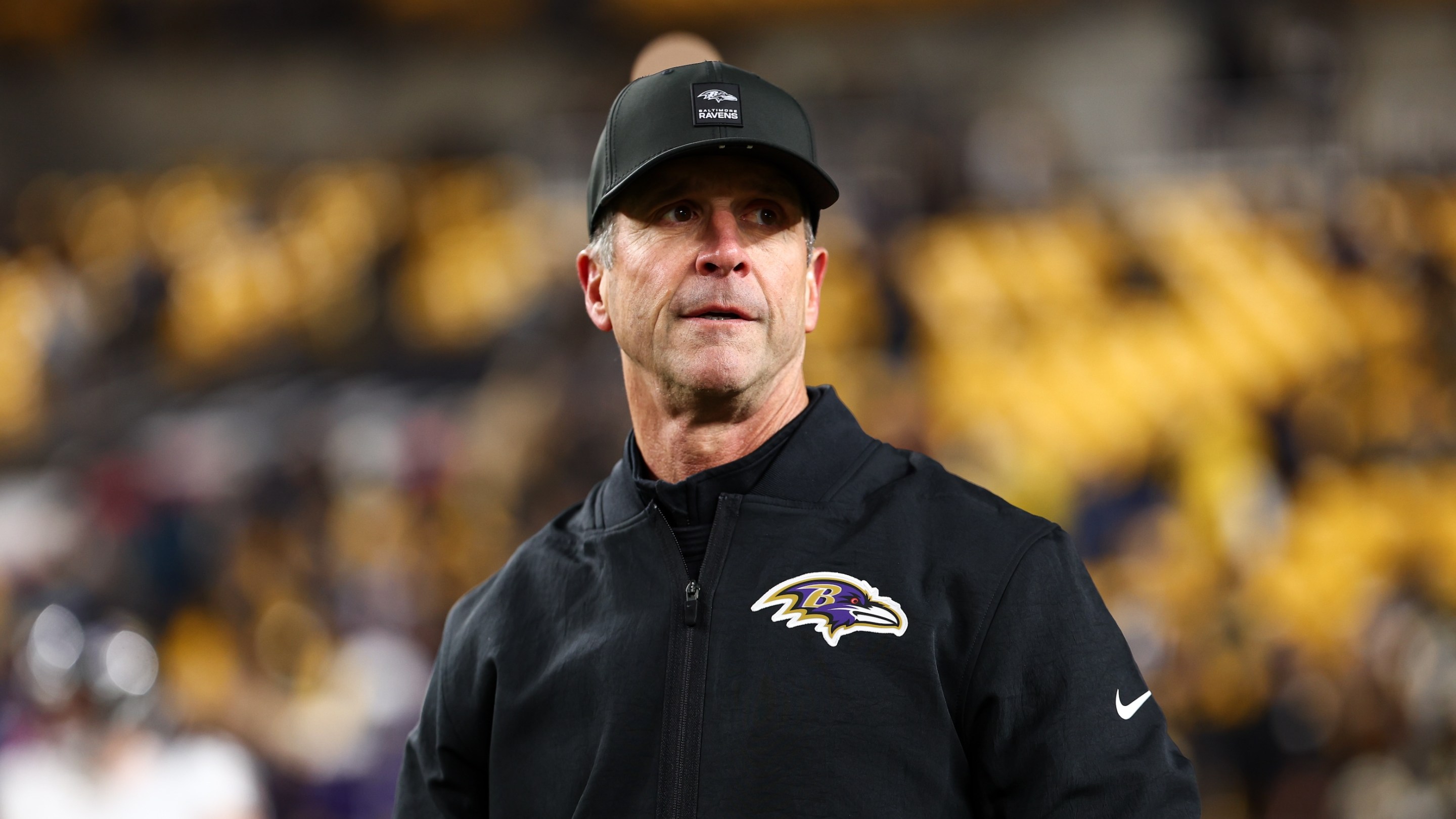 Baltimore Ravens head coach John Harbaugh walks the field prior to the game against the Pittsburgh Steelers on January 4, 2026. He was fired two days after the Ravens lost.