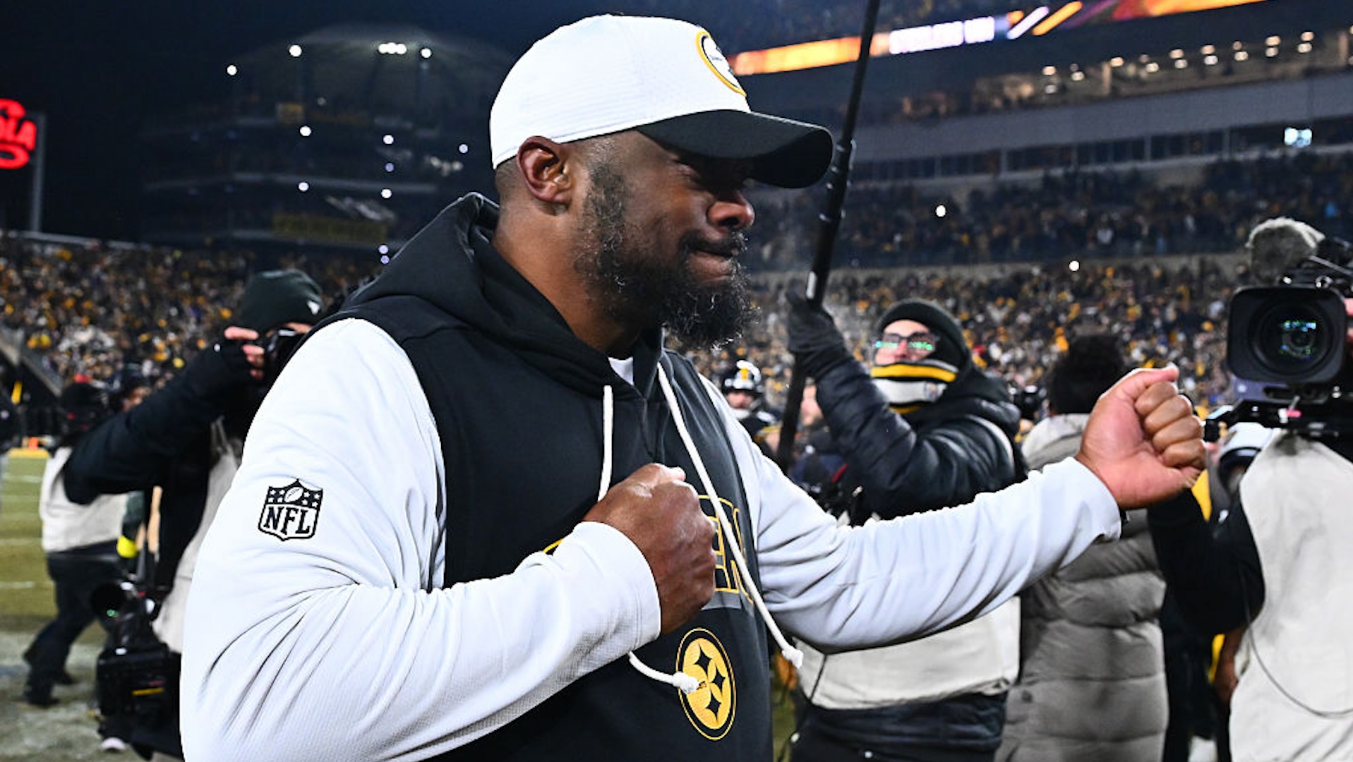 Head coach Mike Tomlin of the Pittsburgh Steelers celebrates after defeating the Baltimore Ravens at Acrisure Stadium on January 04, 2026 in Pittsburgh, Pennsylvania.