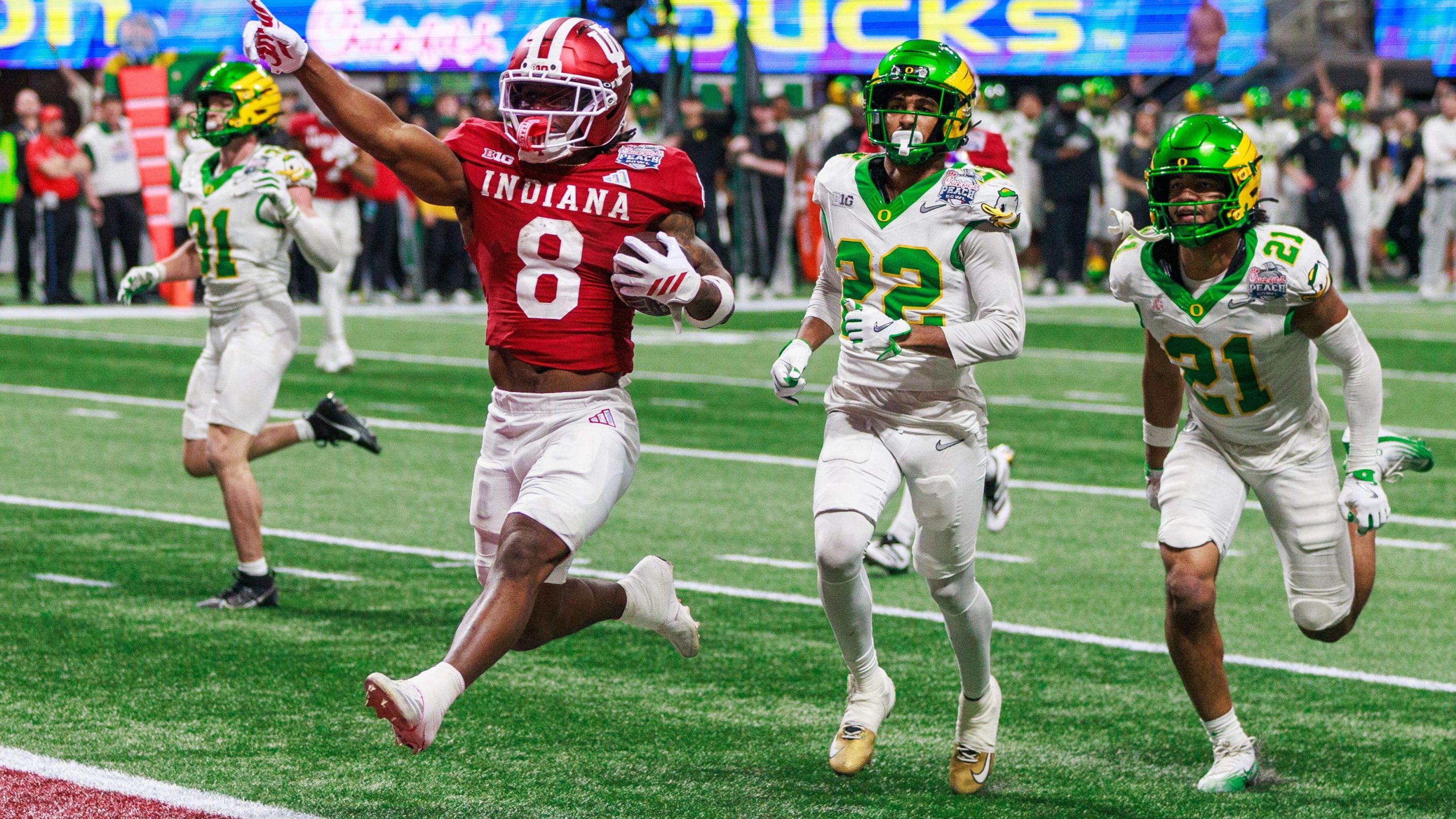 Indiana Hoosiers running back Kaelon Black (8) runs a touchdown against Oregon during the Chick-fil-A Peach Bowl.