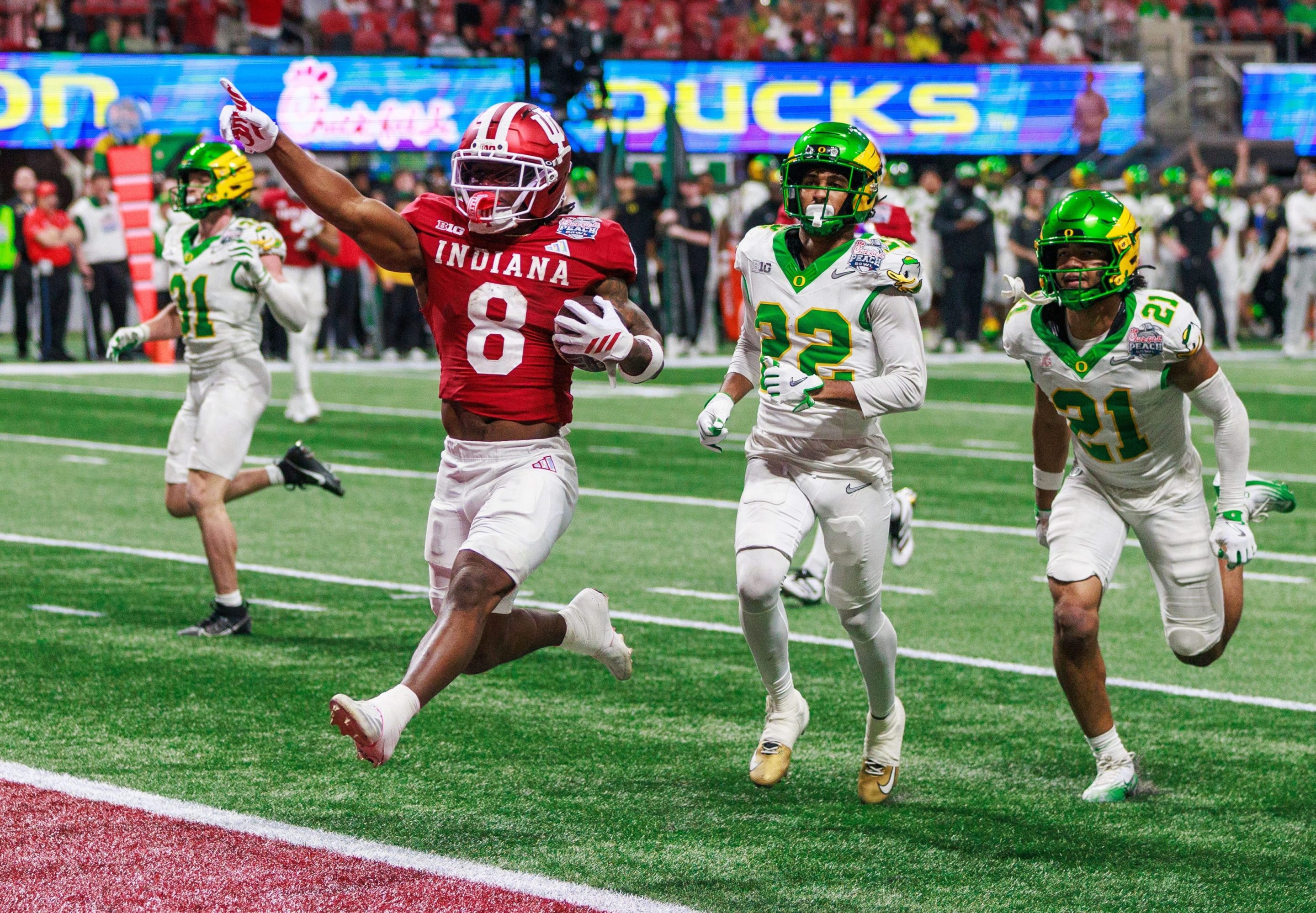 Indiana Hoosiers running back Kaelon Black (8) runs a touchdown against Oregon during the Chick-fil-A Peach Bowl.