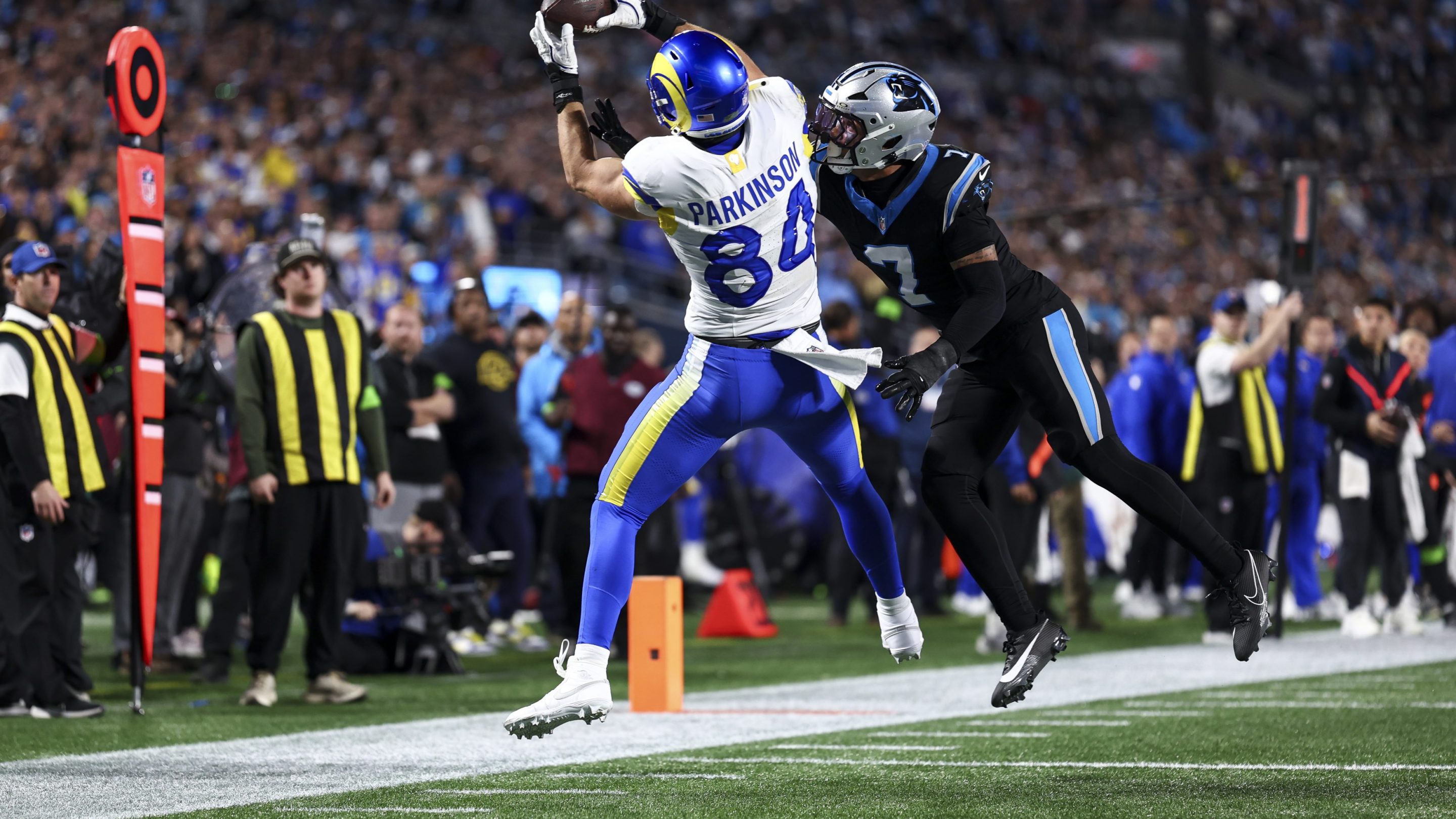 Colby Parkinson #84 of the Los Angeles Rams catches a pass to score a touchdown