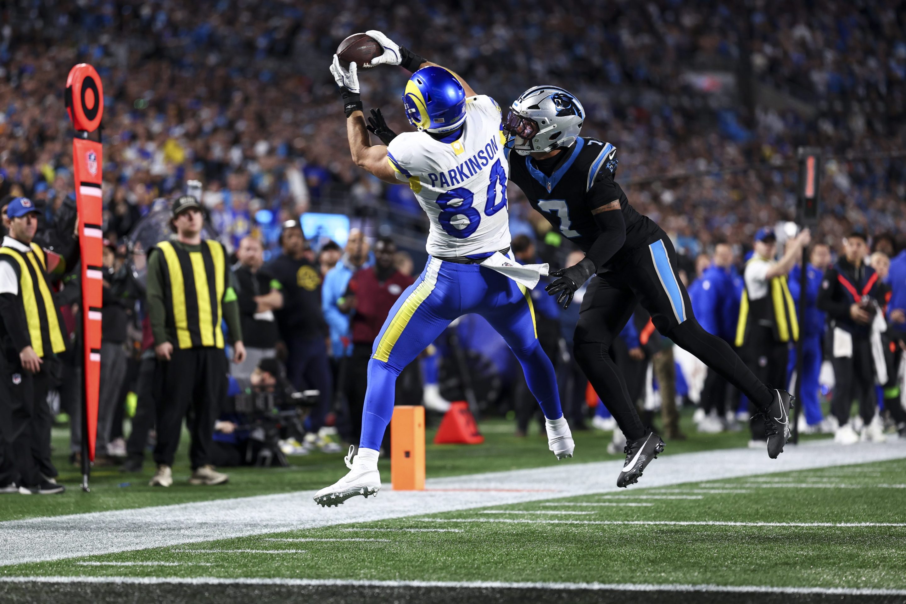 Colby Parkinson #84 of the Los Angeles Rams catches a pass to score a touchdown