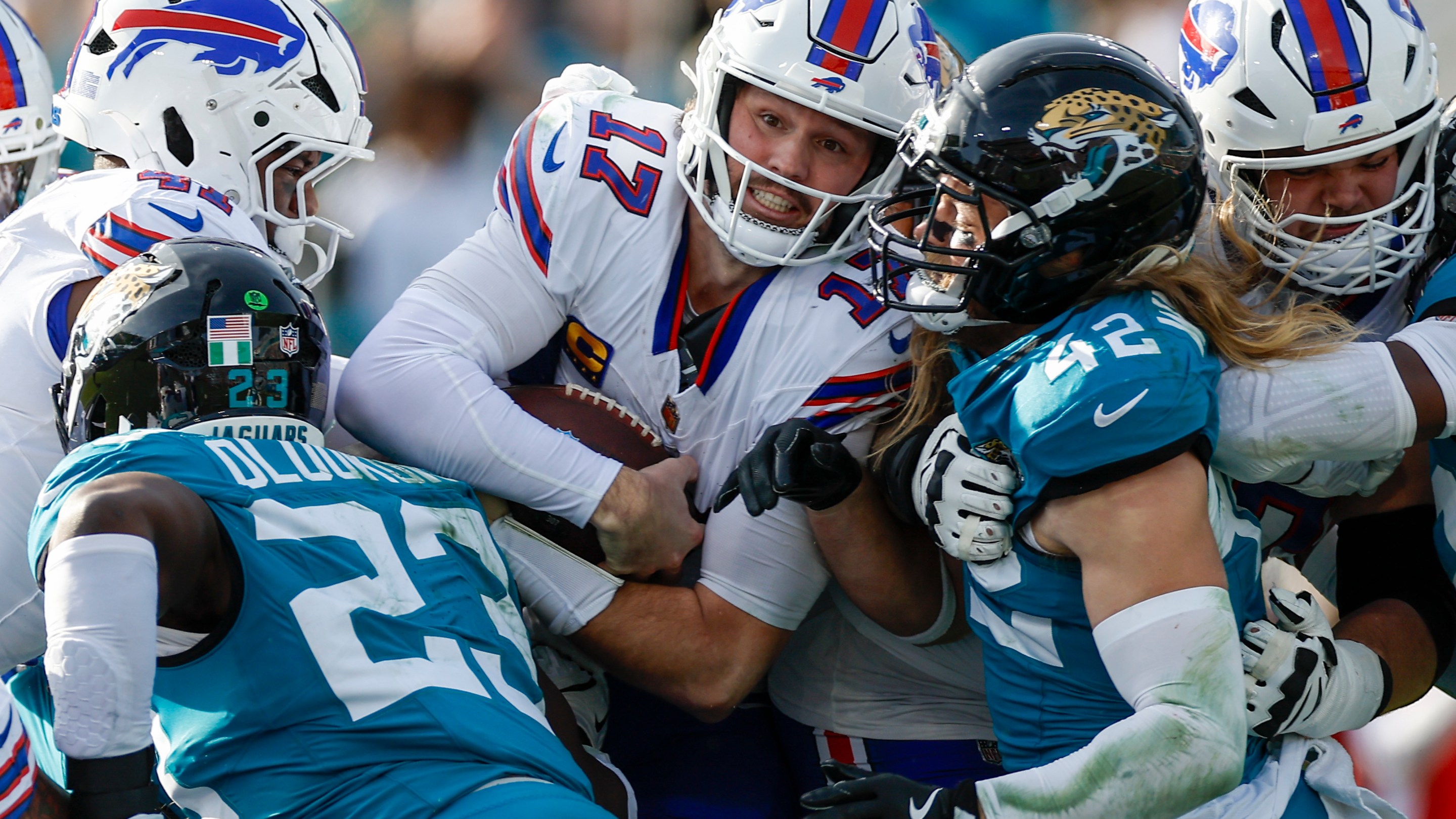 Josh Allen #17 of the Buffalo Bills runs with the ball during the AFC Wildcard Playoff game between the Jacksonville Jaguars and the Buffalo Bills