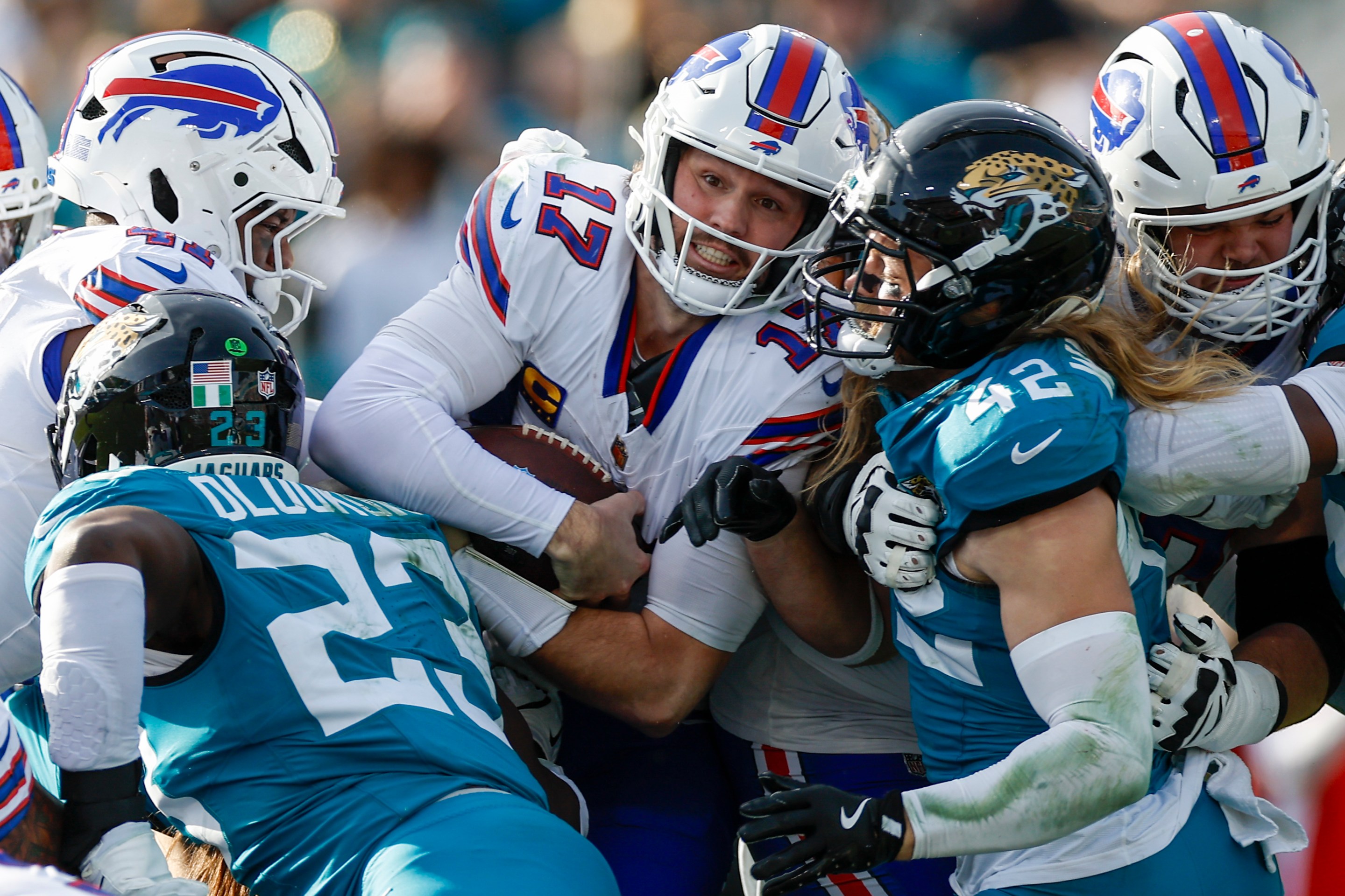 Josh Allen #17 of the Buffalo Bills runs with the ball during the AFC Wildcard Playoff game between the Jacksonville Jaguars and the Buffalo Bills