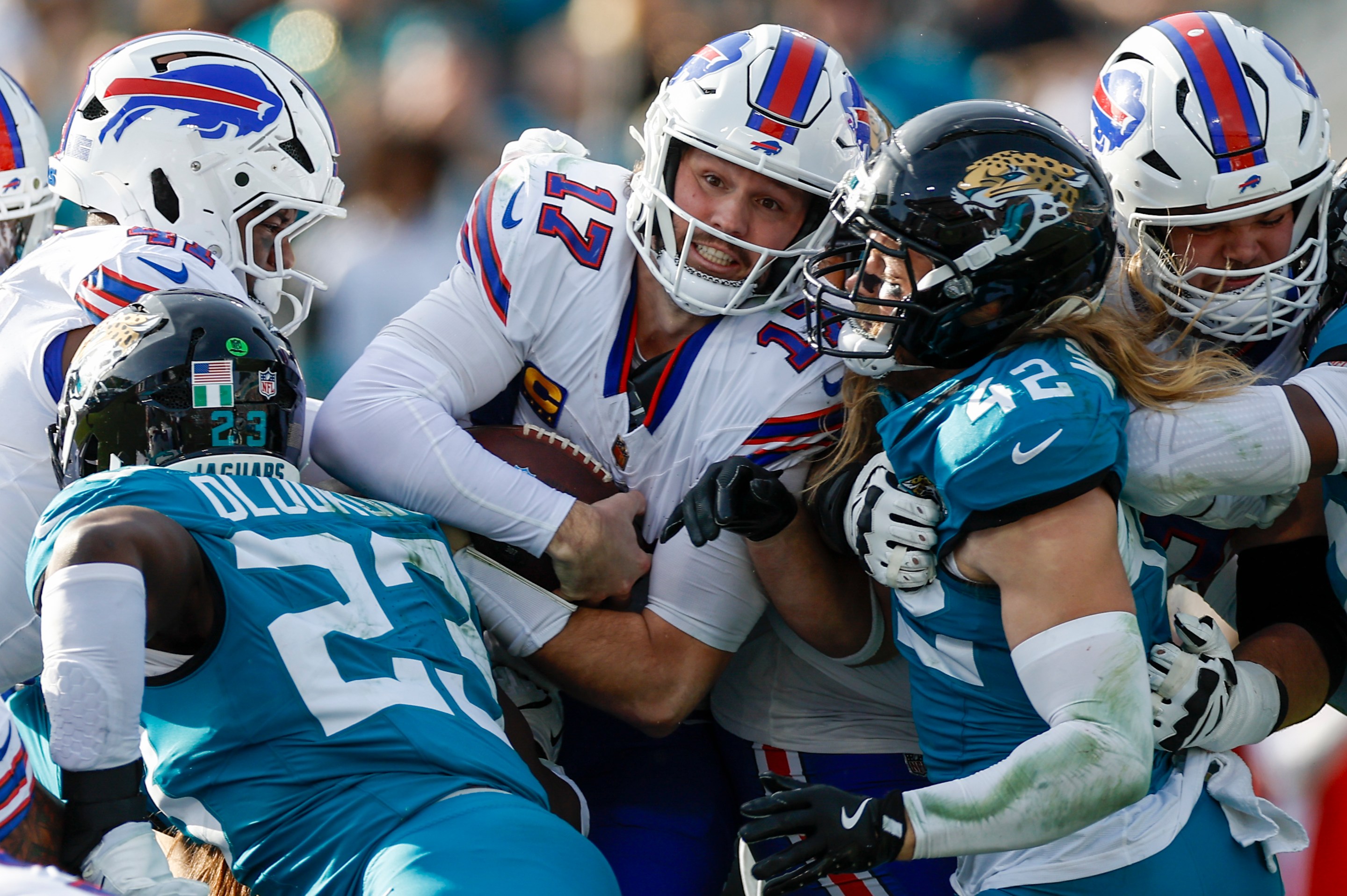 Josh Allen #17 of the Buffalo Bills runs with the ball during the AFC Wildcard Playoff game between the Jacksonville Jaguars and the Buffalo Bills