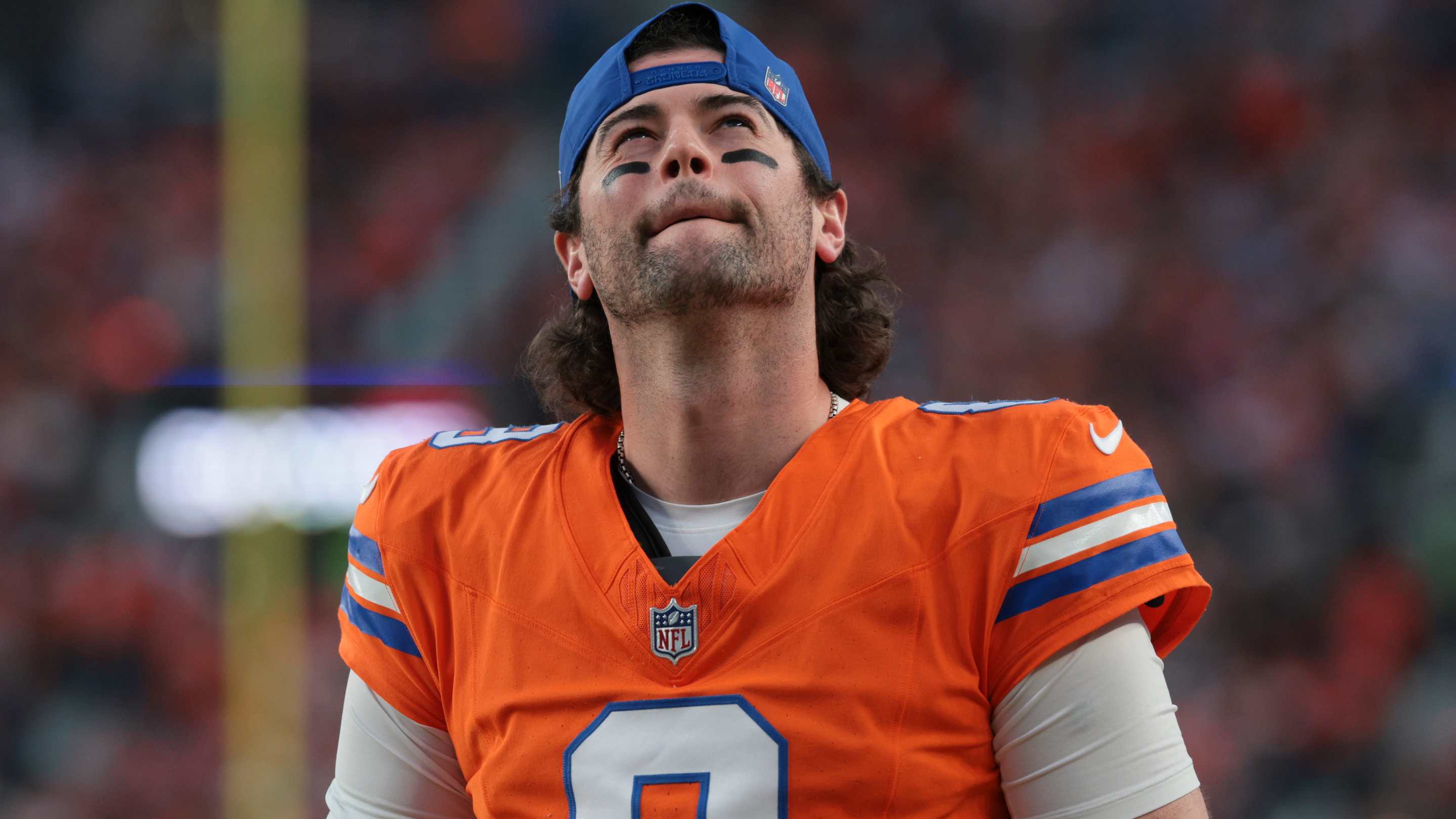 Jarrett Stidham #8 of the Denver Broncos looks on against the Los Angeles Chargers at Empower Field At Mile High
