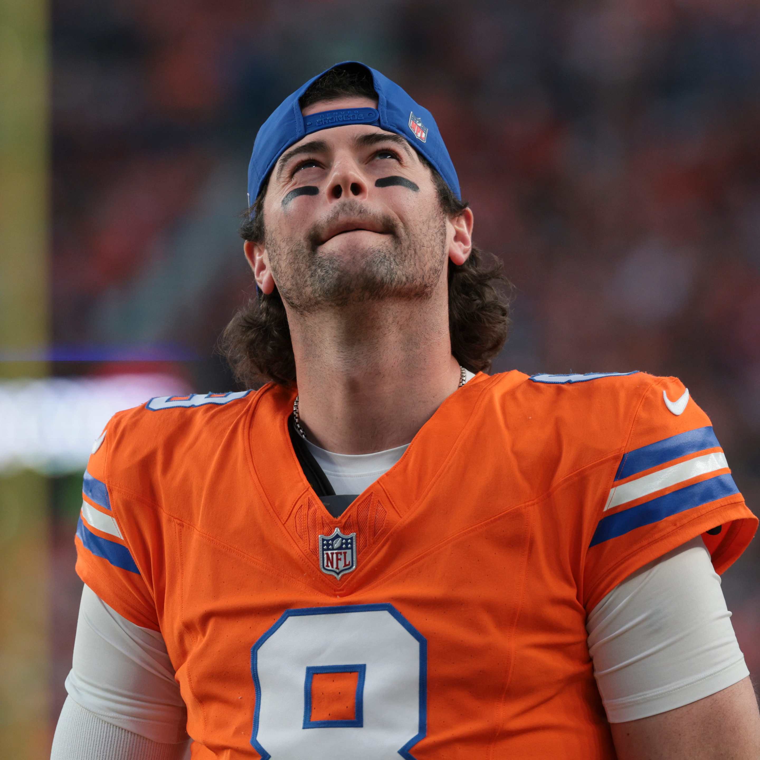 Jarrett Stidham #8 of the Denver Broncos looks on against the Los Angeles Chargers at Empower Field At Mile High