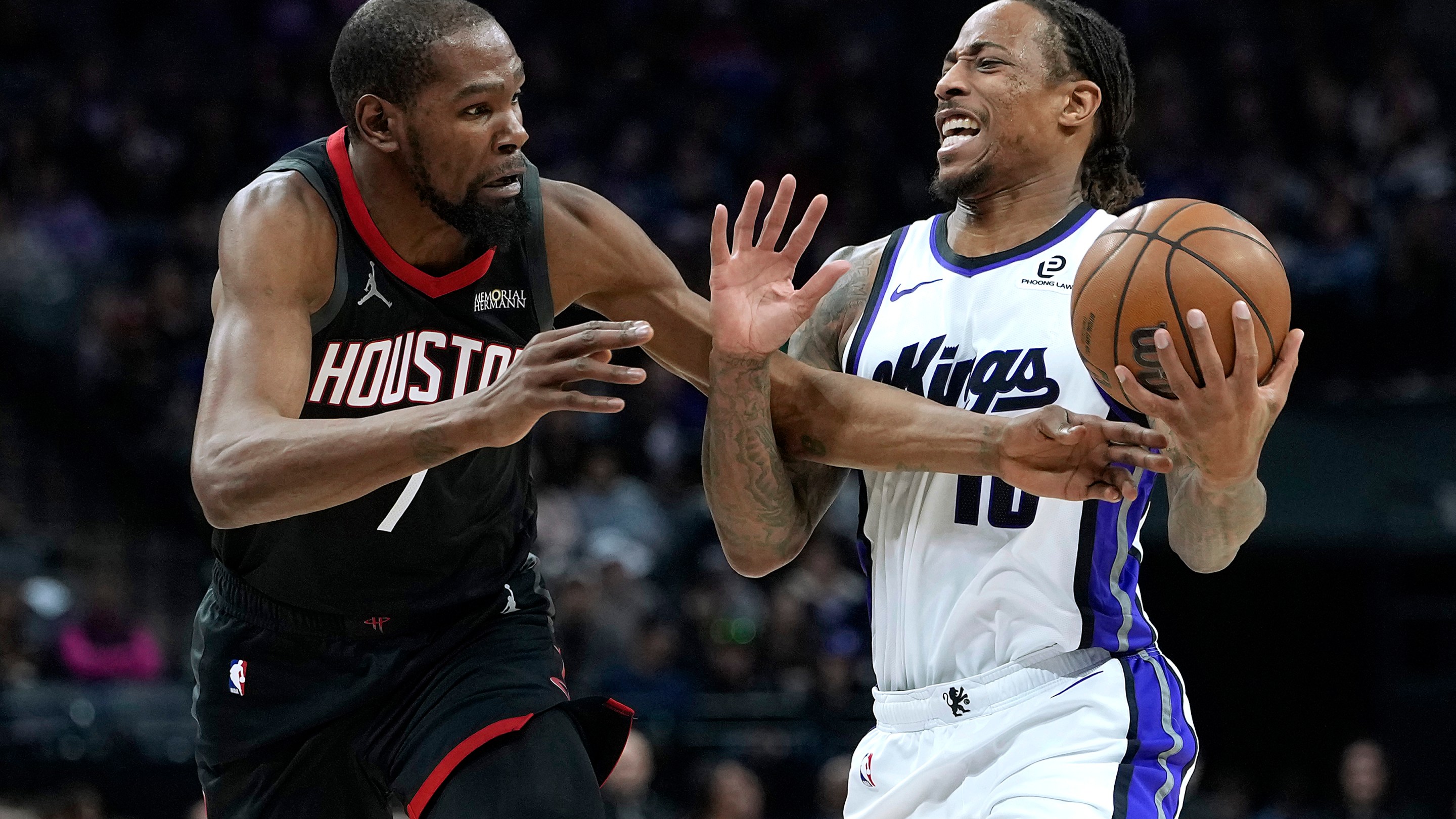 SACRAMENTO, CALIFORNIA - JANUARY 11: DeMar DeRozan #10 of the Sacramento Kings is fouled while going up for a shot against Kevin Durant #7 of the Houston Rockets in the second half at Golden 1 Center on January 11, 2026 in Sacramento, California. NOTE TO USER: User expressly acknowledges and agrees that, by downloading and or using this photograph, User is consenting to the terms and conditions of the Getty Images License Agreement. (Photo by Thearon W. Henderson/Getty Images)