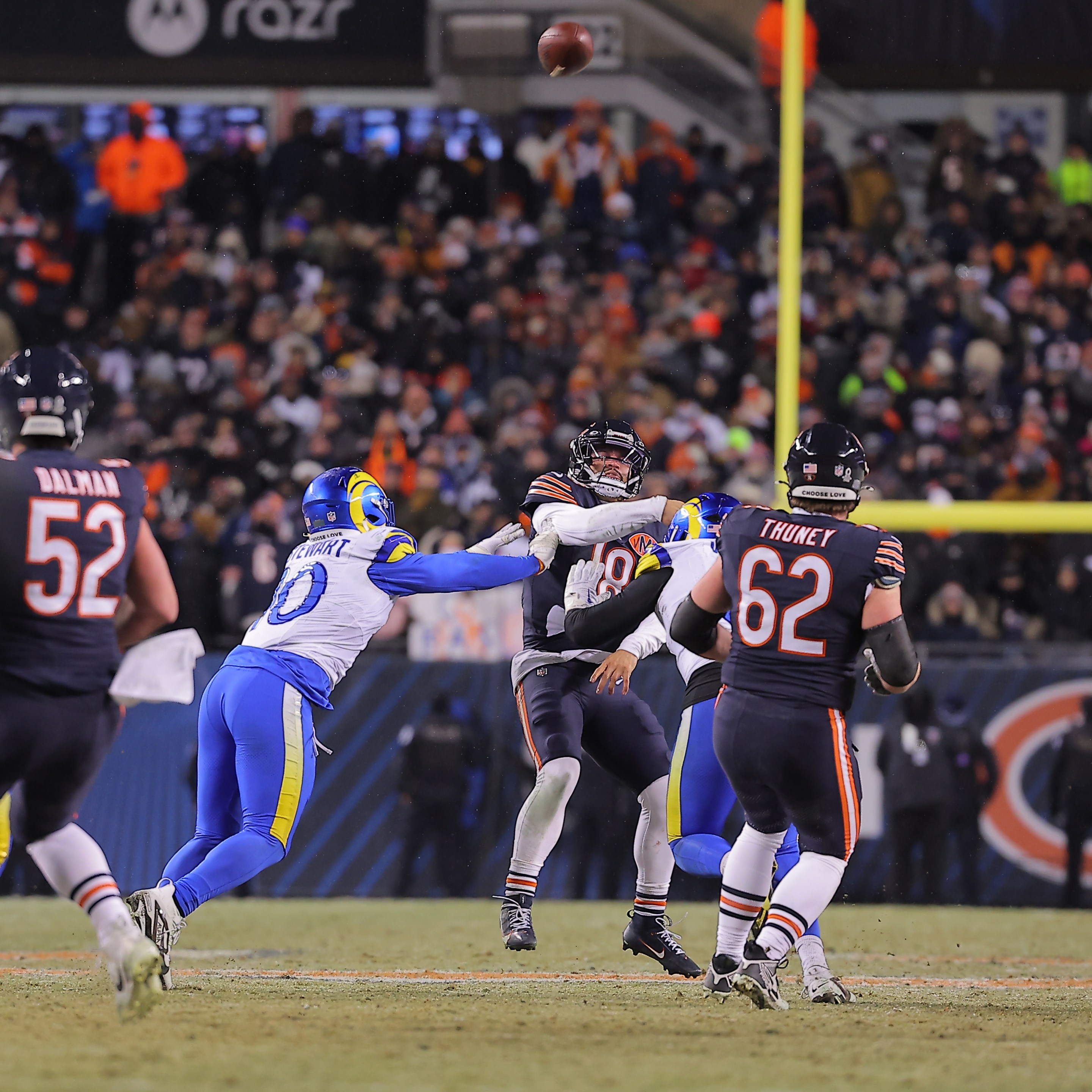 Caleb Williams #18 of the Chicago Bears throws the ball during an NFL divisional playoff football game on January 18, 2026 at Soldier Field in Chicago, Illinois.