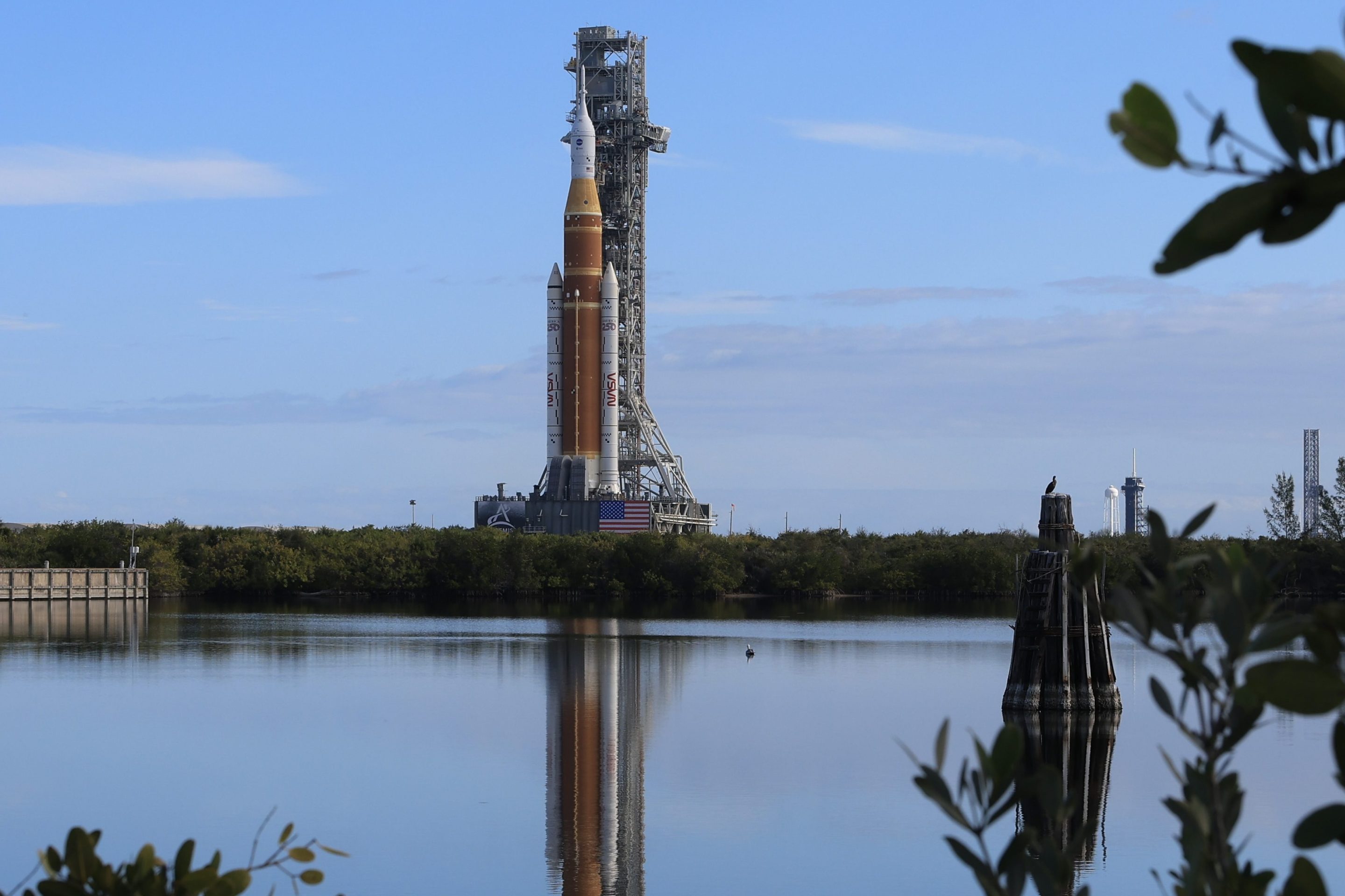CAPE CANAVERAL, FLORIDA - JANUARY 17: NASA's Artemis II is rolled from the Vehicle Assembly Building to Launch Pad 39B at NASA’s Kennedy Space Center on January 17, 2026 in Cape Canaveral, Florida. NASA’s integrated SLS (Space Launch System) rocket and Orion spacecraft for the Artemis II mission are being rolled to Launch Pad 39B ahead of the 10-day mission in February 2026, which will take the crew around the Moon and back to Earth. (Photo by Joe Raedle/Getty Images)
