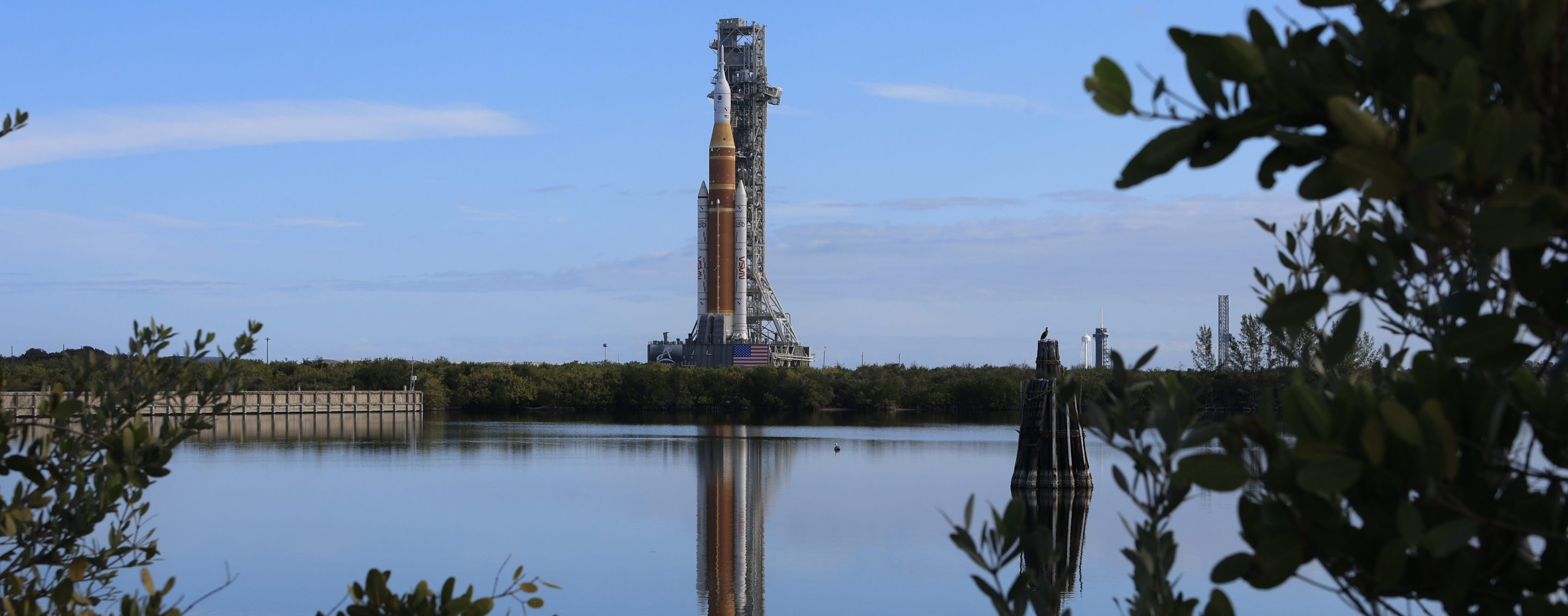 CAPE CANAVERAL, FLORIDA - JANUARY 17: NASA's Artemis II is rolled from the Vehicle Assembly Building to Launch Pad 39B at NASA’s Kennedy Space Center on January 17, 2026 in Cape Canaveral, Florida. NASA’s integrated SLS (Space Launch System) rocket and Orion spacecraft for the Artemis II mission are being rolled to Launch Pad 39B ahead of the 10-day mission in February 2026, which will take the crew around the Moon and back to Earth. (Photo by Joe Raedle/Getty Images)