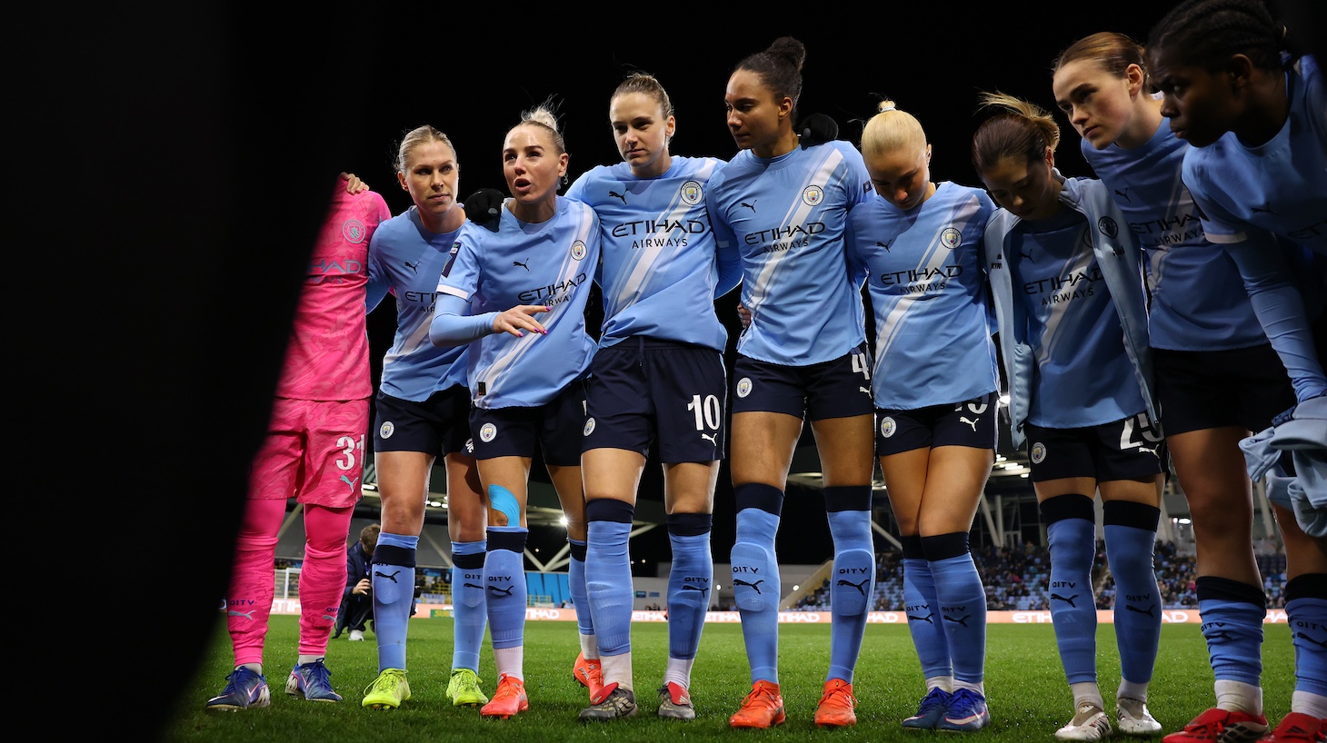 Manchester City players huddle ahead of the Subway Women's League Cup Semi Final match between Manchester City and Chelsea at Joie Stadium on January 21, 2026 in Manchester, England.