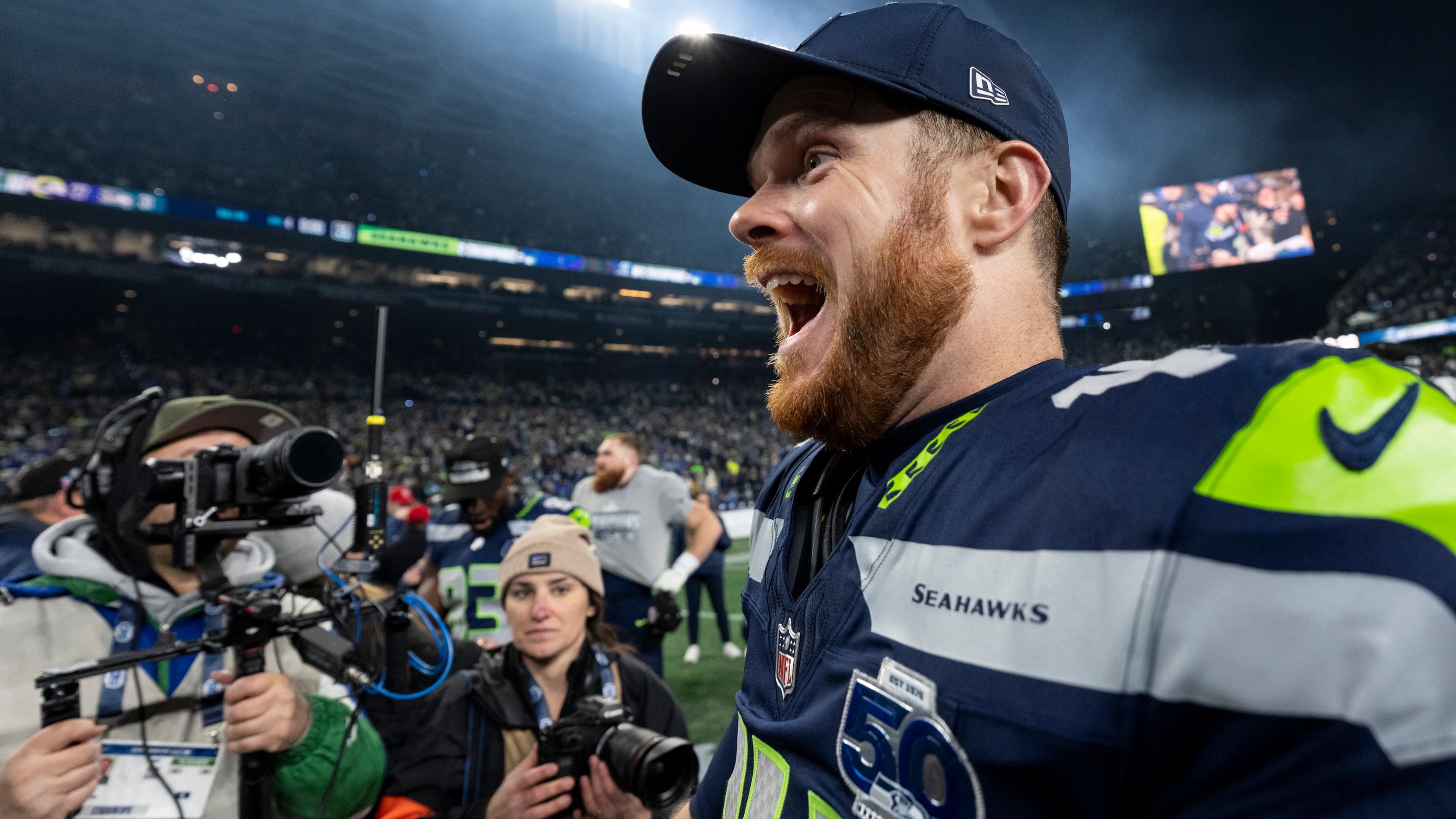 Sam Darnold of the Seattle Seahawks whoots enthusiastically following an NFC Championship NFL football game against the Los Angeles Rams at Lumen Field on January 25, 2026 in Seattle, Washington.